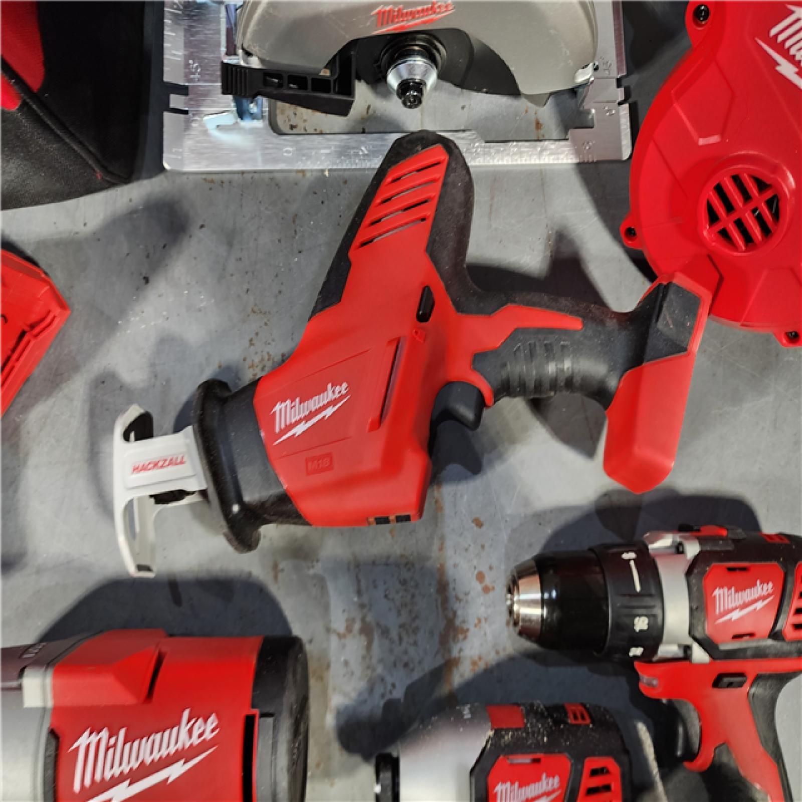 HOUSTON LOCATION - AS-IS MILWAUKEE 9 TOOL COMBO KIT W/ (2) BATTERY & CHARGER