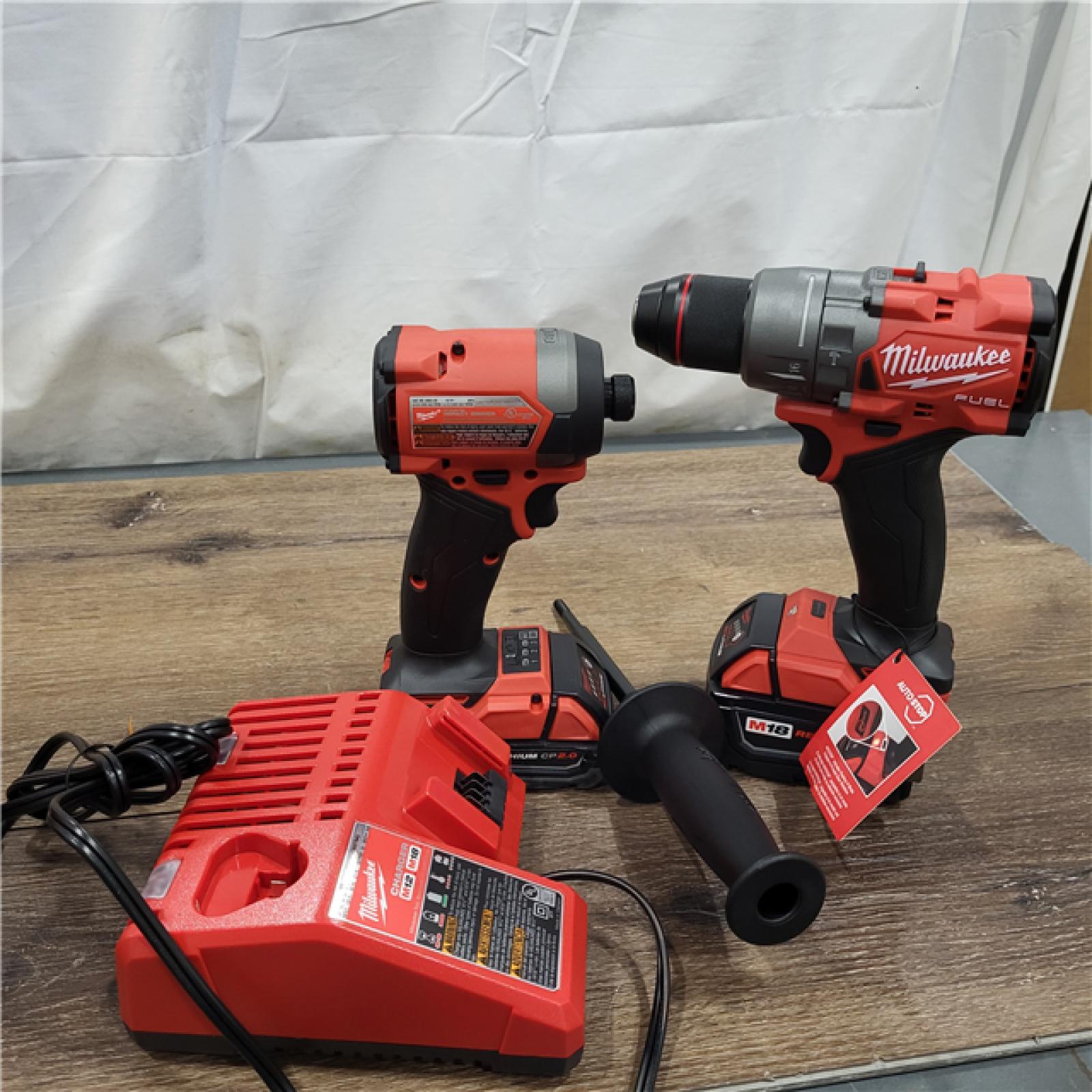 AS-IS Milwaukee M18 FUEL 18V Lithium-Ion Brushless Cordless Hammer Drill and Impact Driver Combo Kit (2-Tool) with 2 Batteries