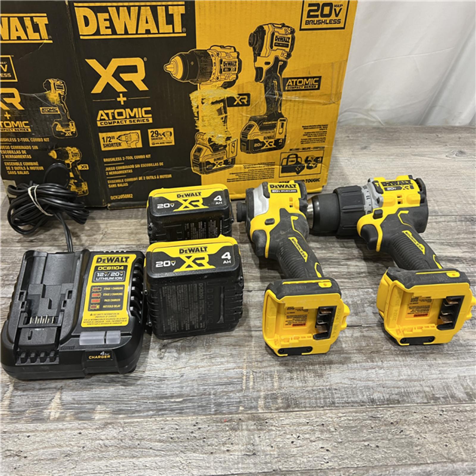 AS-IS DEWALT 20V MAX XR Hammer Drill and ATOMIC Impact Driver 2 Tool Cordless Combo Kit with (2) 4.0Ah Batteries, Charger, and Bag