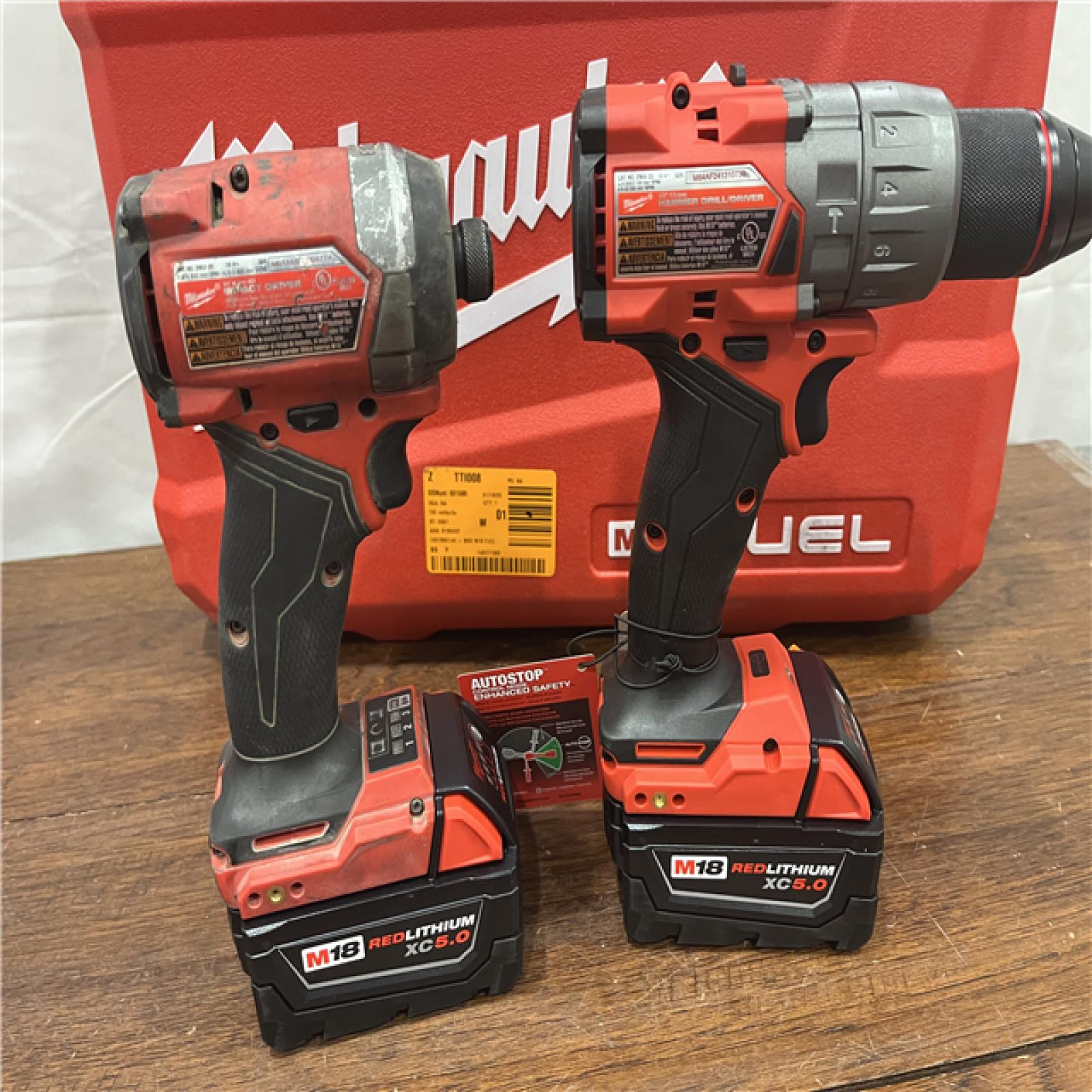 AS-IS Milwaukee M18 FUEL 18V Lithium-Ion Brushless Cordless Hammer Drill and Impact Driver Combo Kit (2-Tool) with 2 Batteries