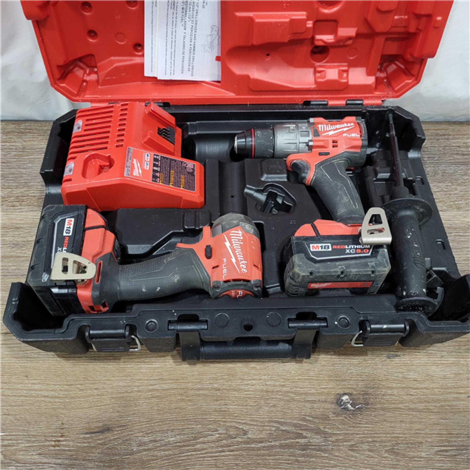 AS-IS M18 FUEL 18V Lithium-Ion Brushless Cordless Hammer Drill and Impact Driver Combo Kit (2-Tool) with 2 Batteries