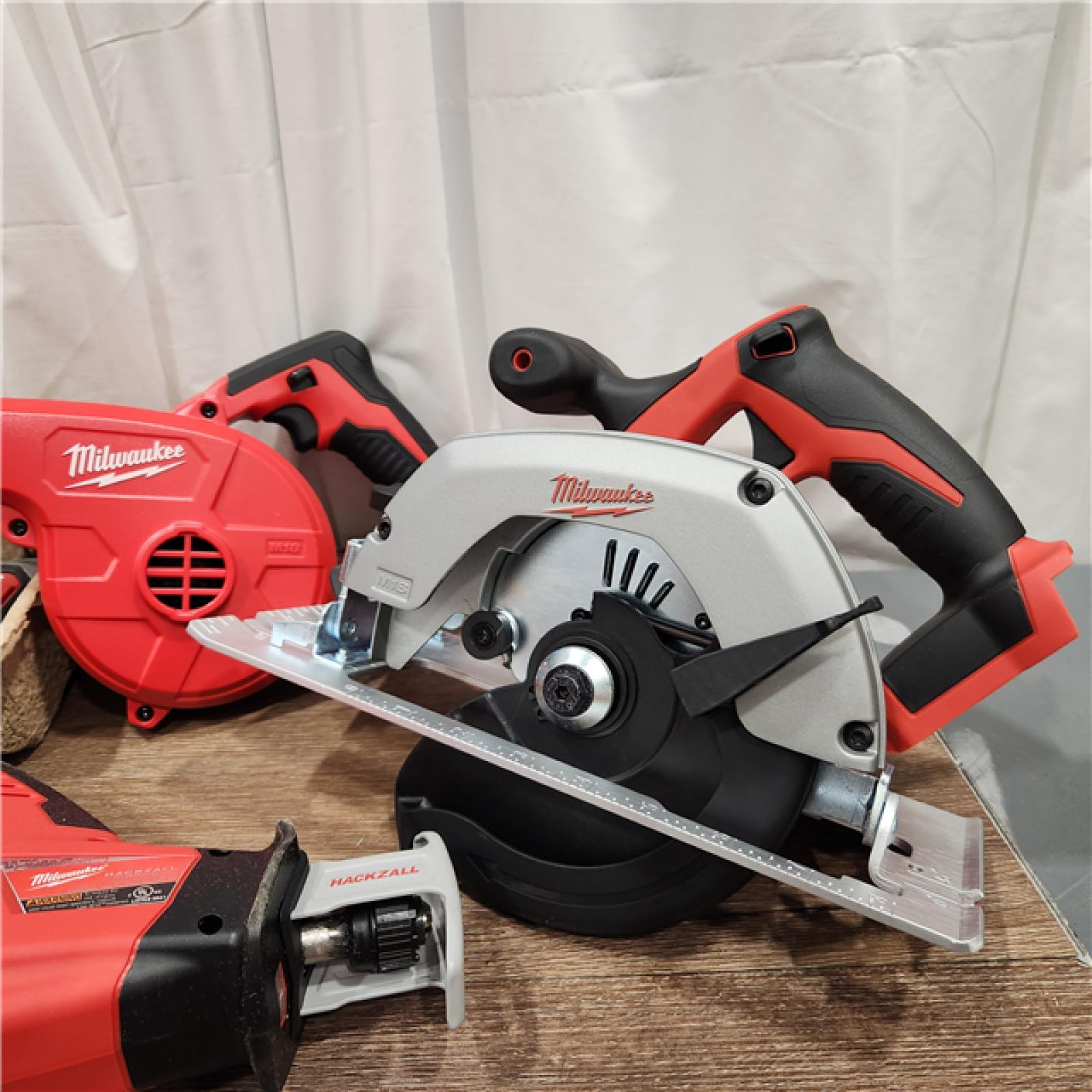 AS-IS MILWAUKEE  M18 18-Volt Lithium-Ion Cordless Combo Kit (9-Tool) with (2) Batteries, Charger, and Tool Bag