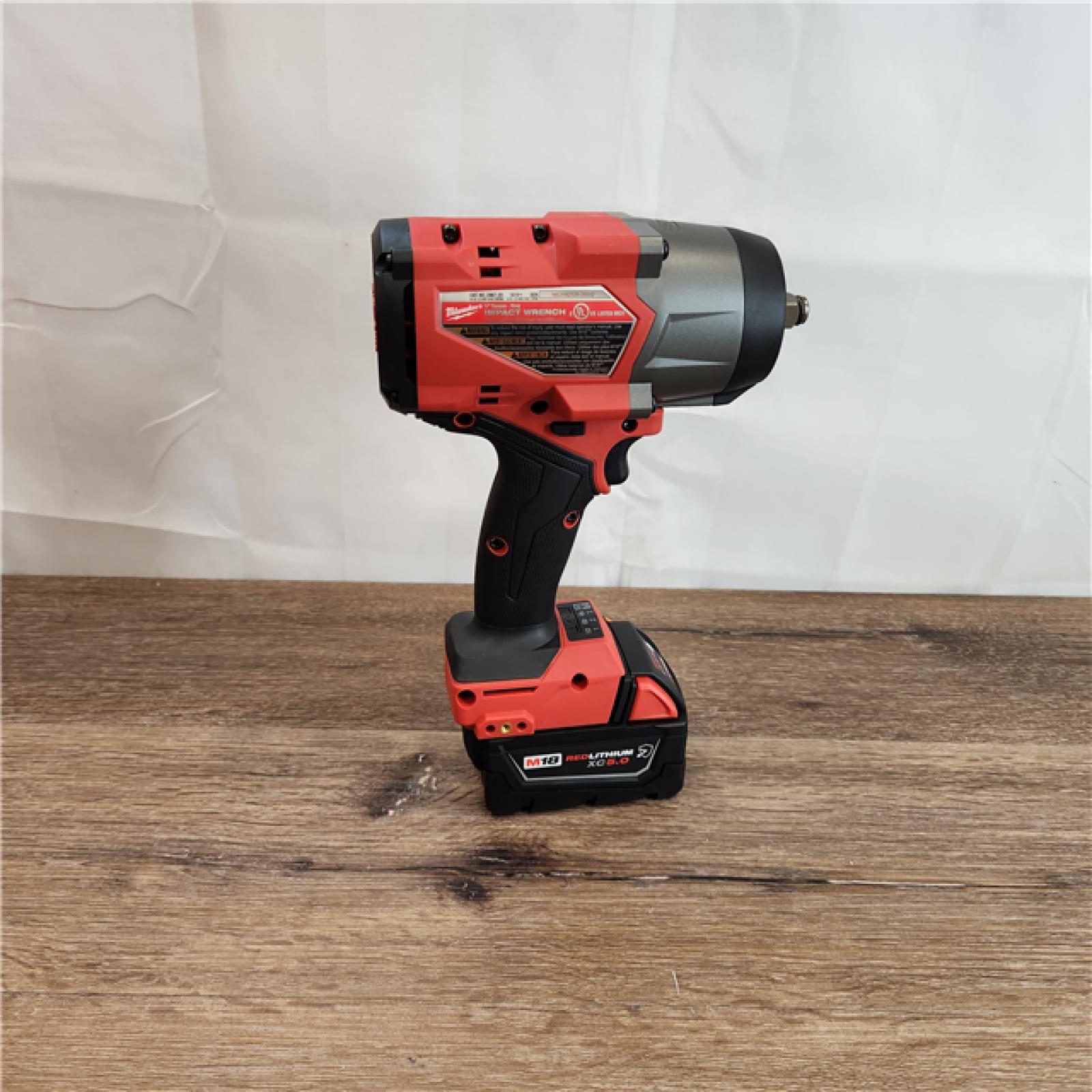 AS-IS Milwaukee M18 FUEL 18V Lithium-Ion Brushless Cordless High-Torque 1/2 in. Impact Wrench W/Friction Ring Kit