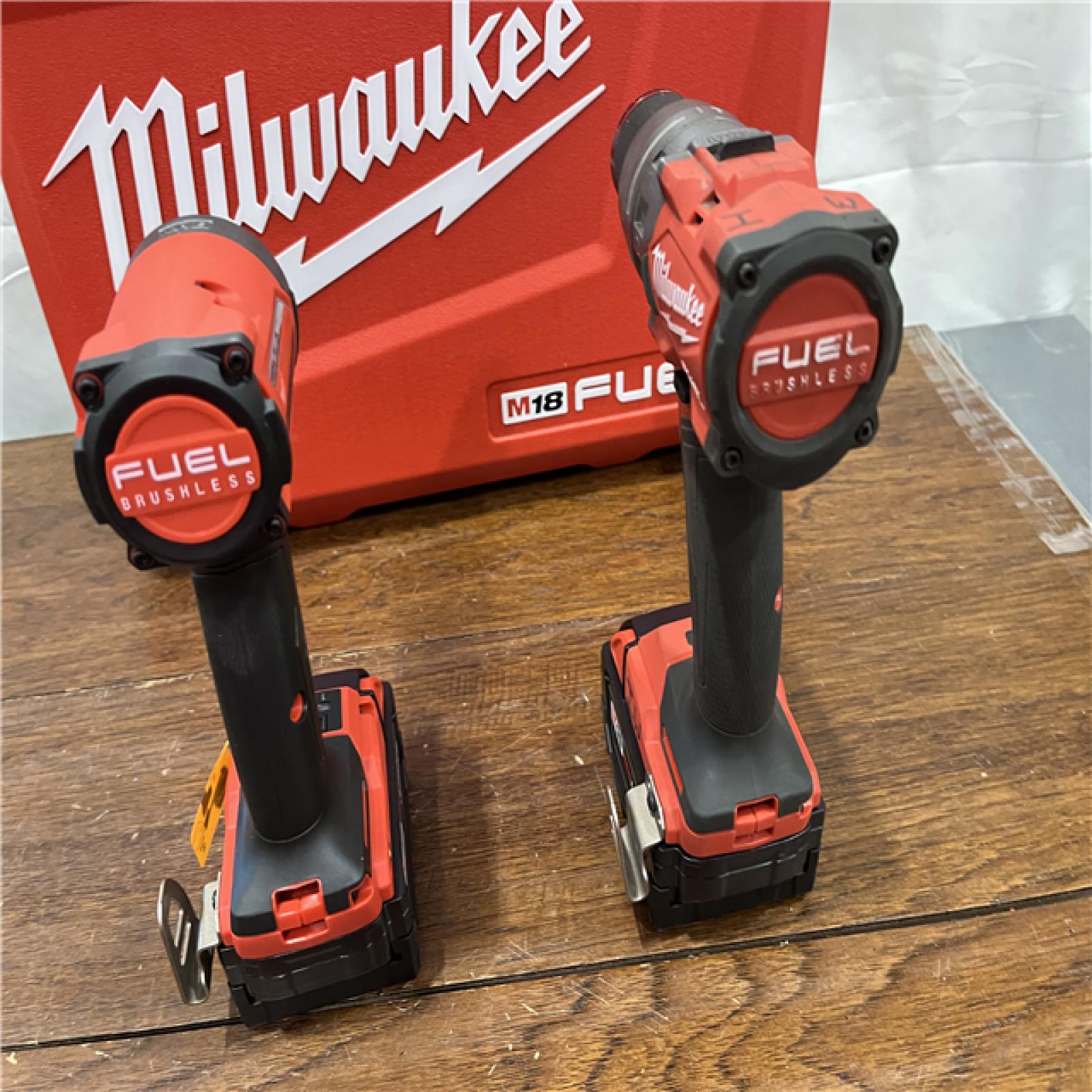 AS-IS Milwaukee M18 FUEL 18V Lithium-Ion Brushless Cordless Hammer Drill and Impact Driver Combo Kit (2-Tool) with 2 Batteries