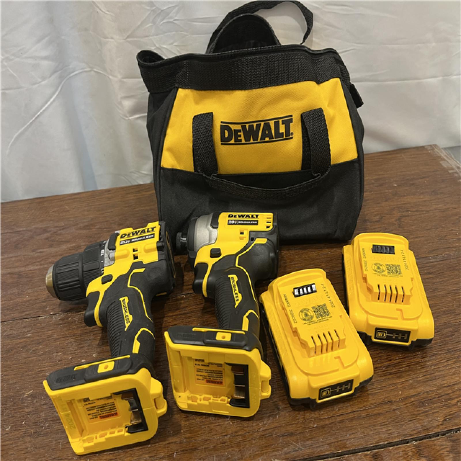 AS-ISDewalt DCK225D2 20V MAX ATOMIC Brushless Compact Lithium-Ion 1/2 in. Cordless Drill Driver and 1/4 in. Impact Driver Combo Kit with 2 Batteries 2 Ah