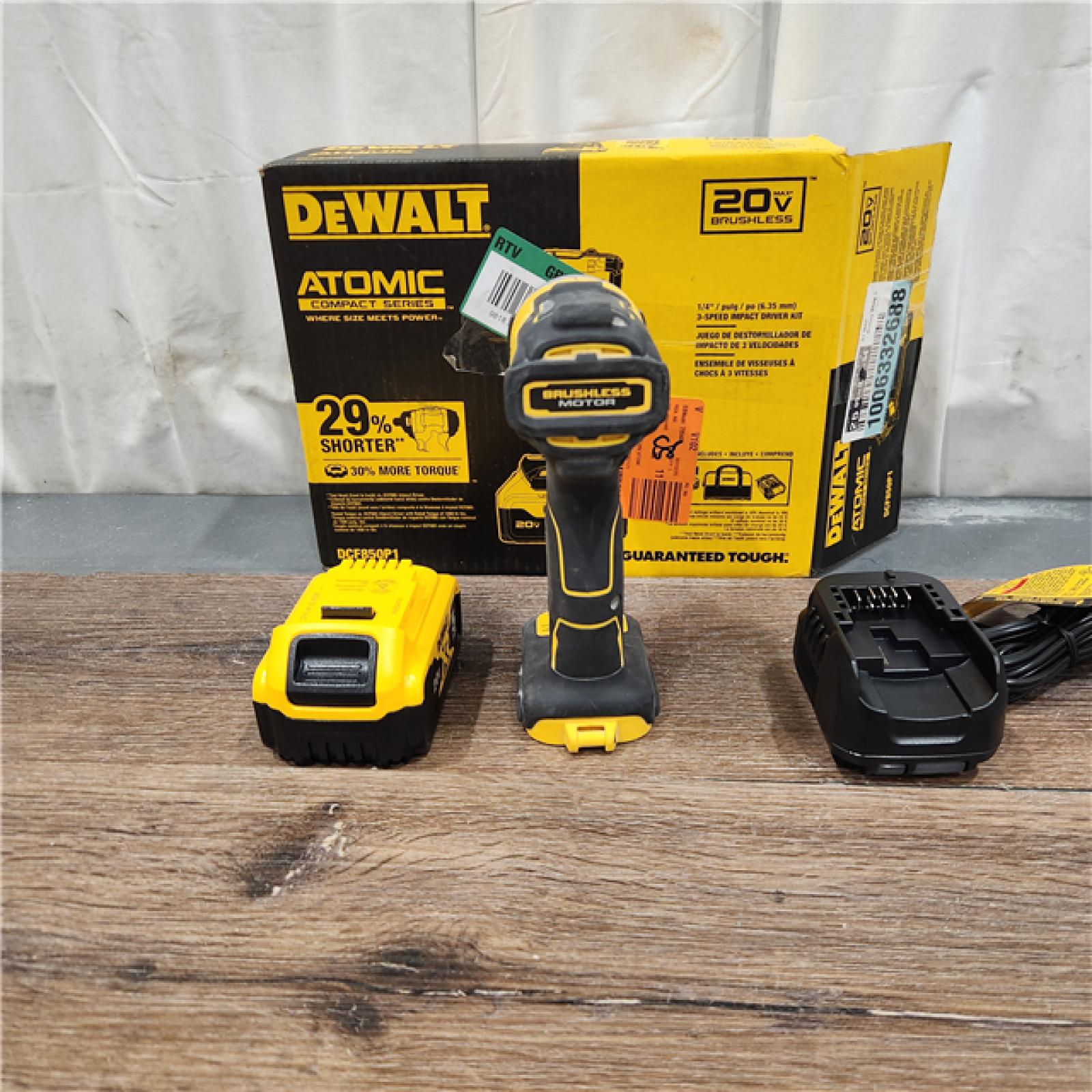 AS IS DEWALT ATOMIC 20V MAX Lithium-Ion Cordless 1/4 in. Brushless Impact Driver Kit, 5 Ah Battery, Charger, and Bag