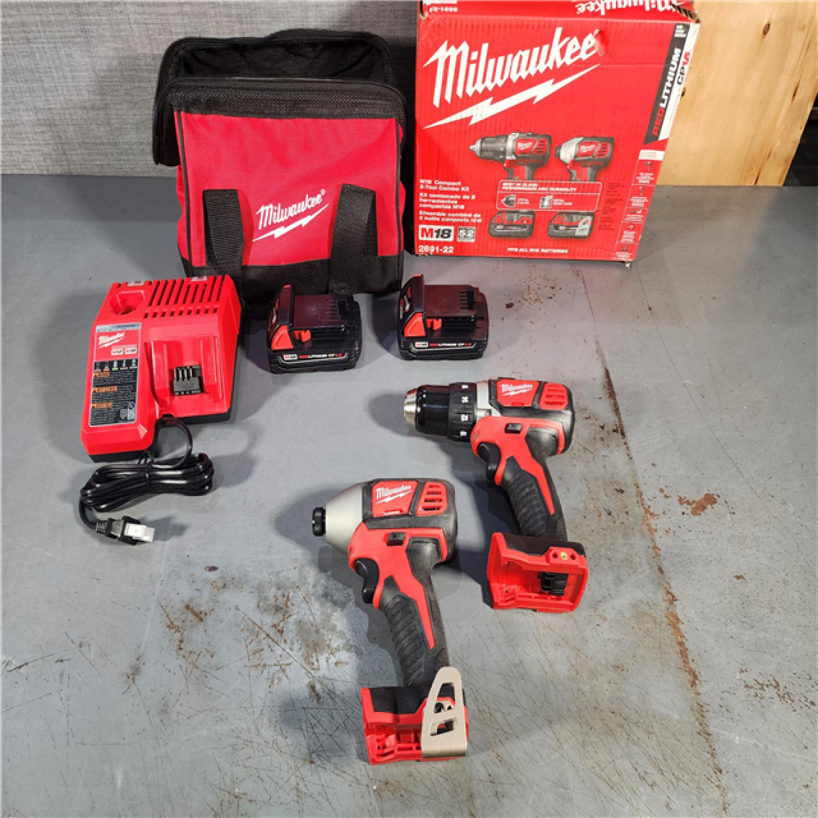 HOUSTON LOCATION - AS-IS (APPEARS LIKE NEW) Milwaukee M18 18V Cordless Brushed 2 Tool Drill/Driver and Impact Driver Kit