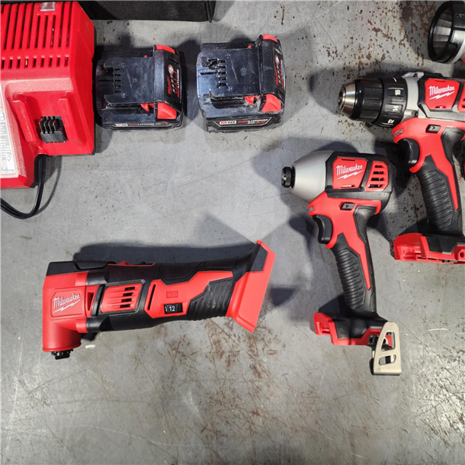 HOUSTON LOCATION - AS-IS M18 18V Lithium-Ion Cordless Combo Kit (5-Tool) with (2) Batteries, Charger and Tool Bag