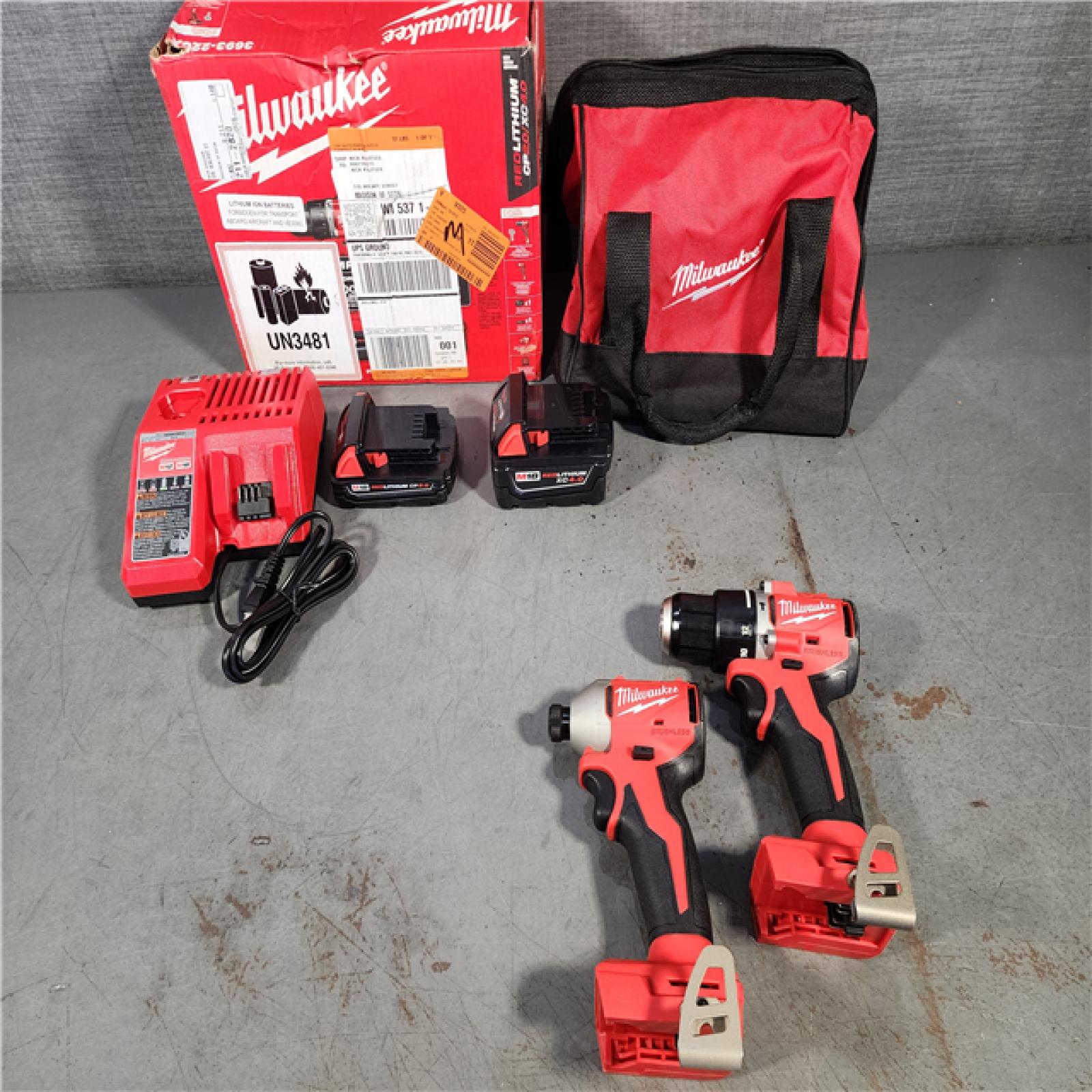 HOUSTON LOCATION - AS-IS M18 18-Volt Lithium-Ion Brushless Cordless Compact Hammer Drill/Impact Combo Kit (2-Tool) with (2) Batteries, Bag