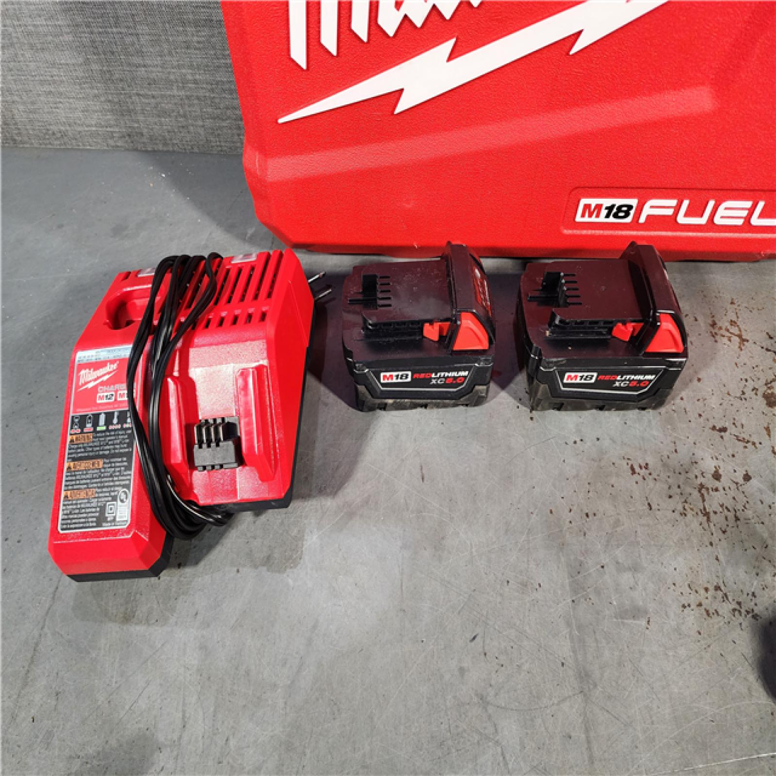 HOUSTON LOCATION - AS-IS Milwaukee M18 FUEL 18V Lithium-Ion Brushless Cordless Hammer Drill and Impact Driver Combo Kit (2-Tool) with 2 Batteries