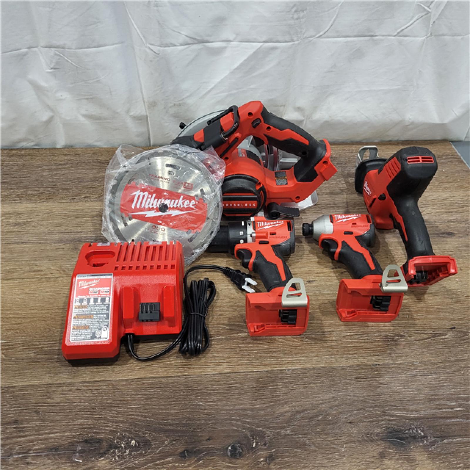 AS-IS M18 18-Volt Lithium-Ion Brushless Cordless Combo Kit (4-Tool) with 2-Batteries, 1-Charger and Tool Bag