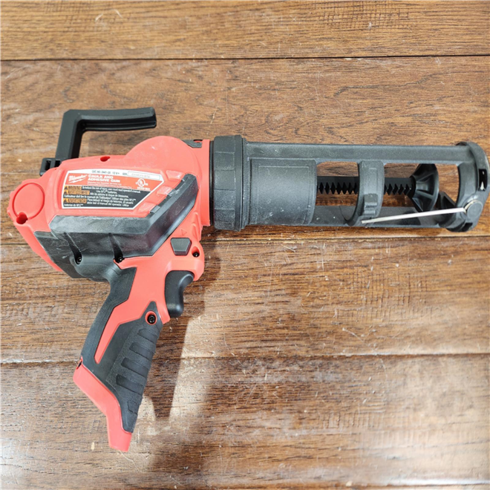 AS-IS Milwaukee M12 Cordless 10 oz. Caulk and Adhesive Gun (Tool-Only)