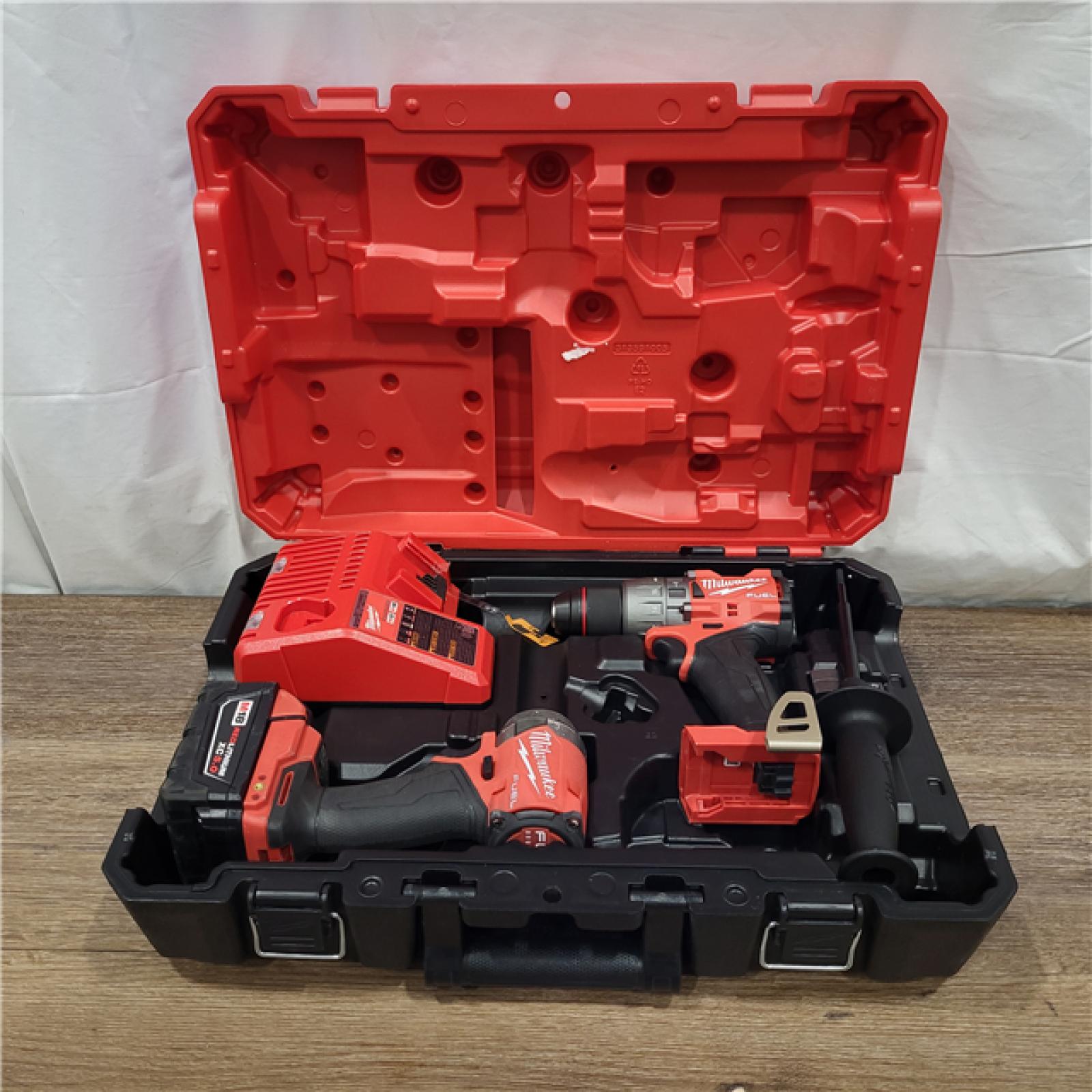 AS-IS M18 FUEL 18V Lithium-Ion Brushless Cordless Hammer Drill and Impact Driver Combo Kit (2-Tool) with 2 Batteries