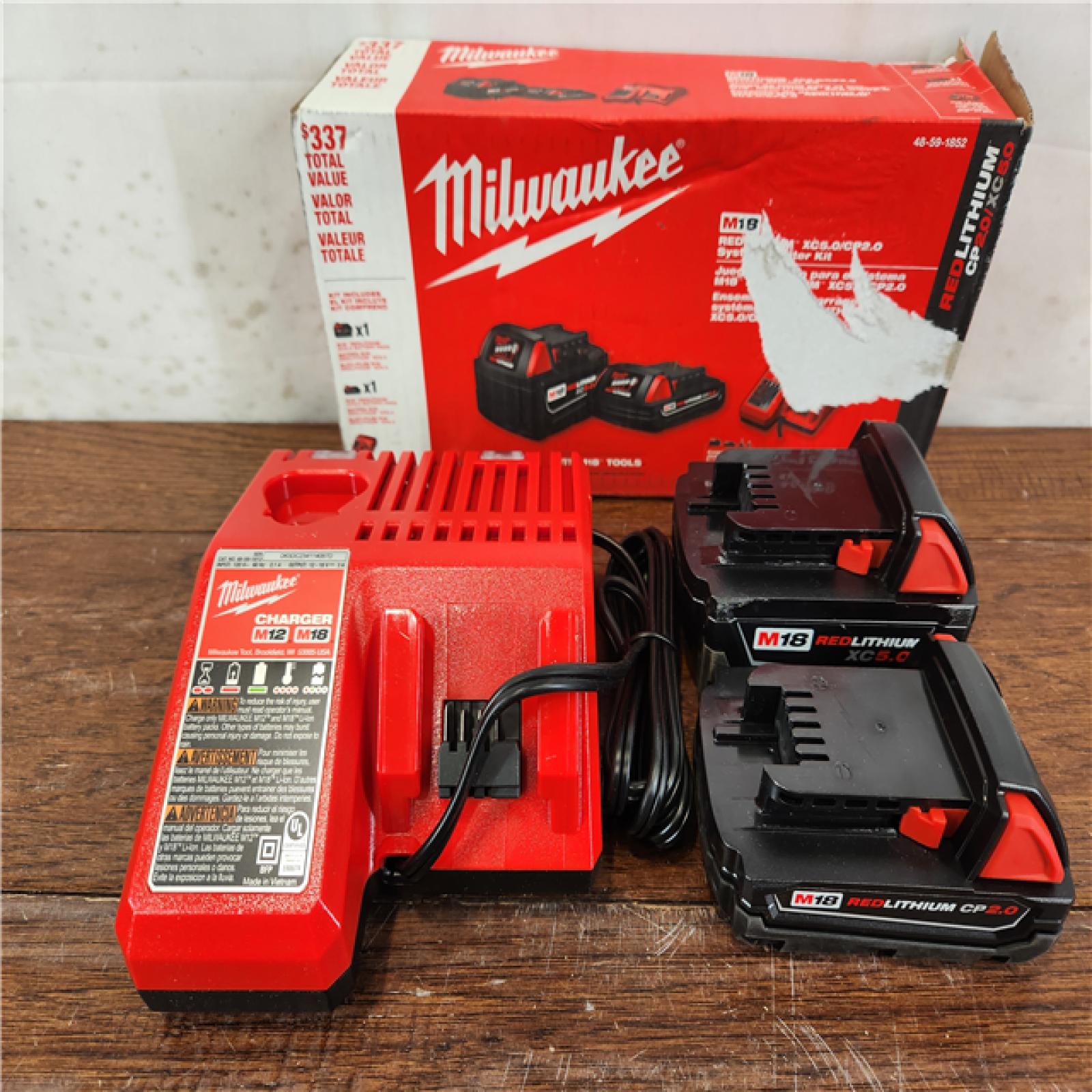 AS-IS Milwaukee M18 18-Volt Lithium-Ion Starter Battery Kit