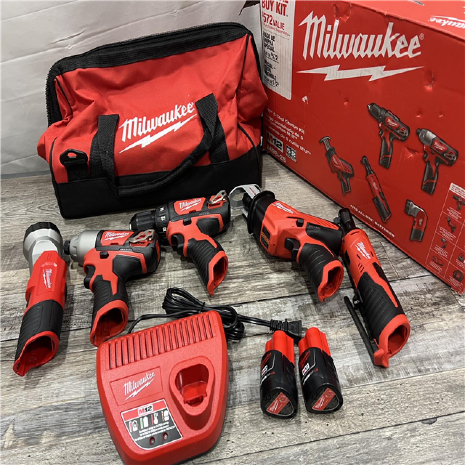 AS-IS Milwaukee M12 12-Volt Lithium-Ion Cordless Combo Kit (5-Tool) with Two 1.5 Ah Batteries, Charger and Tool Bag