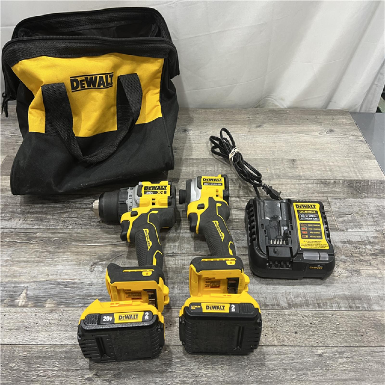 AS-IS DEWALT 20V MAX XR Cordless Drill/Driver, ATOMIC Impact Driver 2 Tool Combo Kit, (2) 2.0Ah Batteries, Charger, and Bag