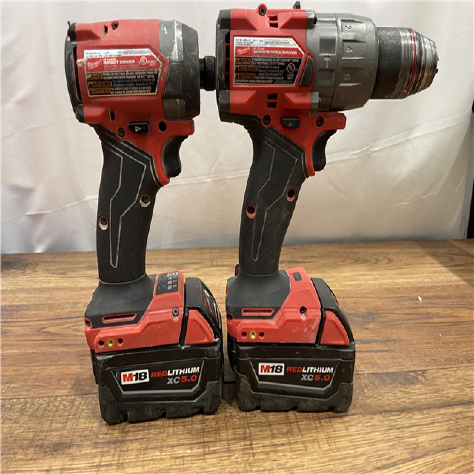 AS-IS Milwaukee M18 FUEL 18V Lithium-Ion Brushless Cordless Hammer Drill and Impact Driver Combo Kit