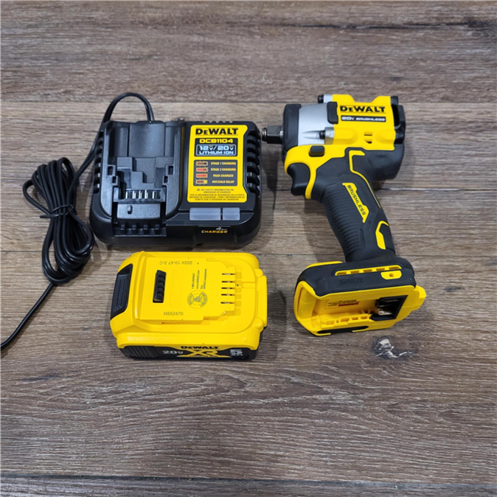 AS-IS DEWALT ATOMIC 20V MAX Lithium-Ion Brushless Cordless 1/2 in. Variable Speed Impact Wrench Kit with 5 Ah Battery and Charger