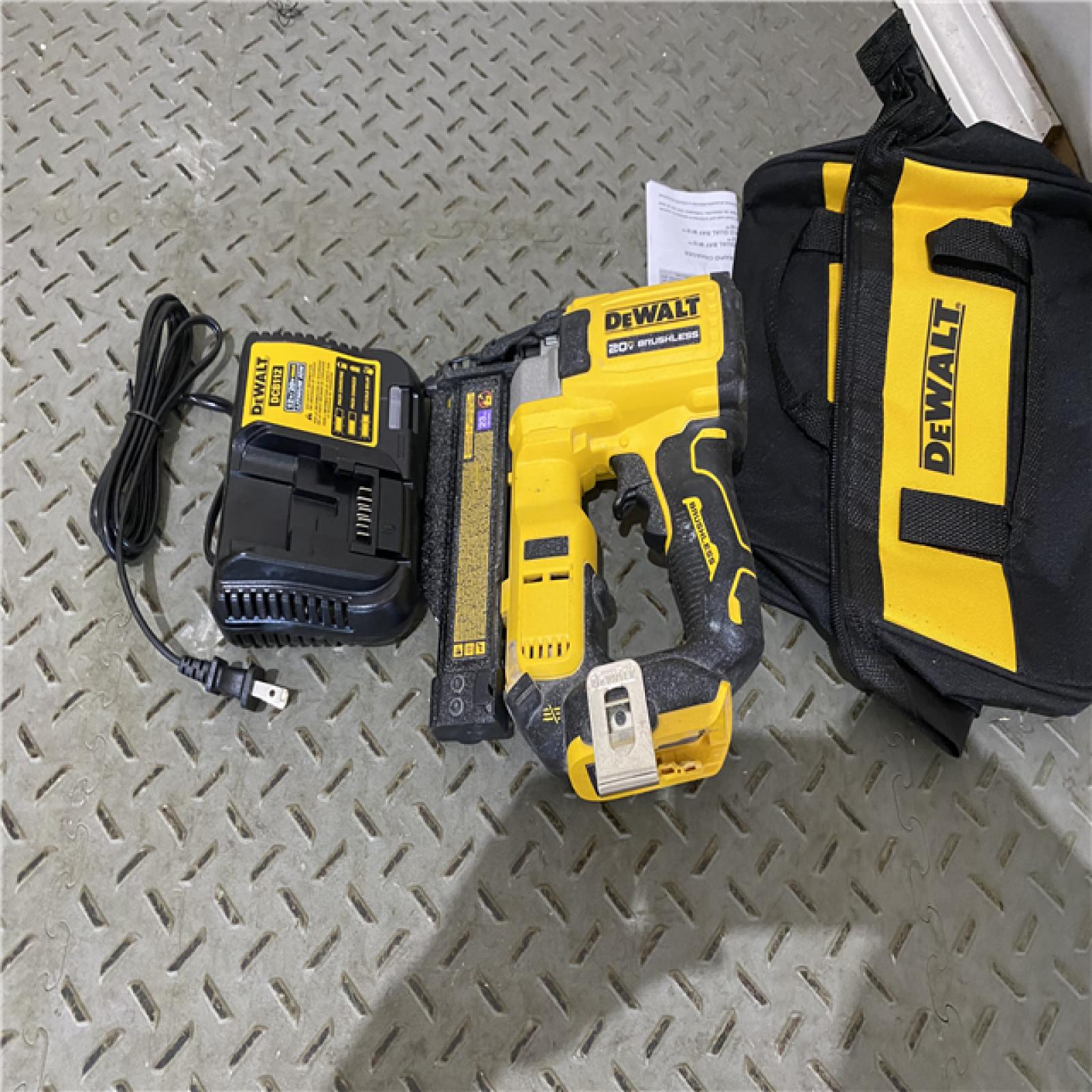 Houston location AS-IS DEWALT ATOMIC 20V MAX Lithium Ion Cordless 23 Gauge Pin Nailer Kit  Charger ONLY