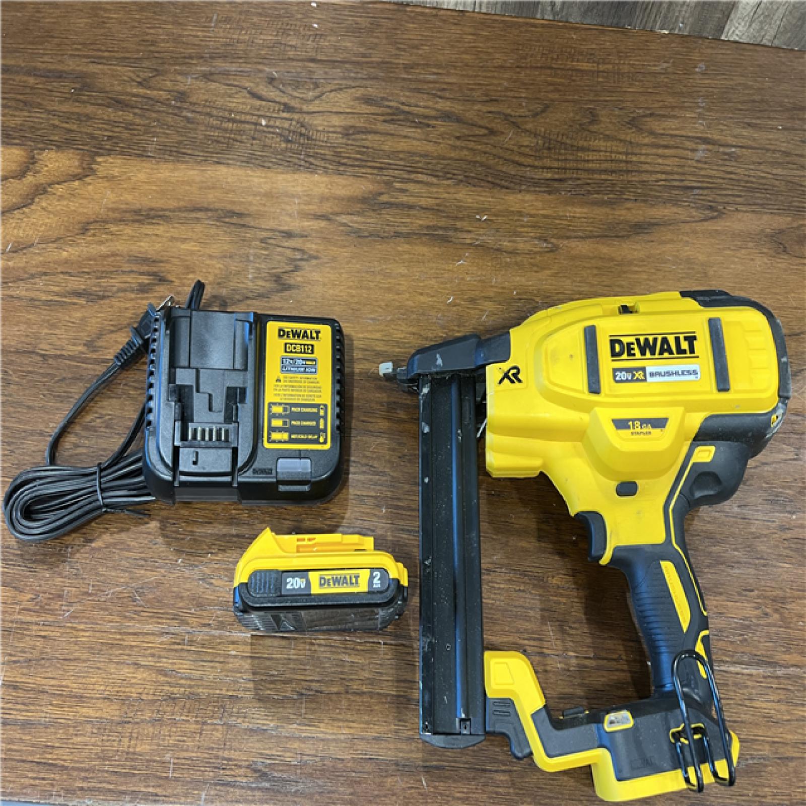 AS-IS DEWALT  20V MAX XR Lithium-Ion Cordless 18-Gauge Narrow Crown Stapler Kit with 2.0Ah Battery, Charger and Contractor Bag