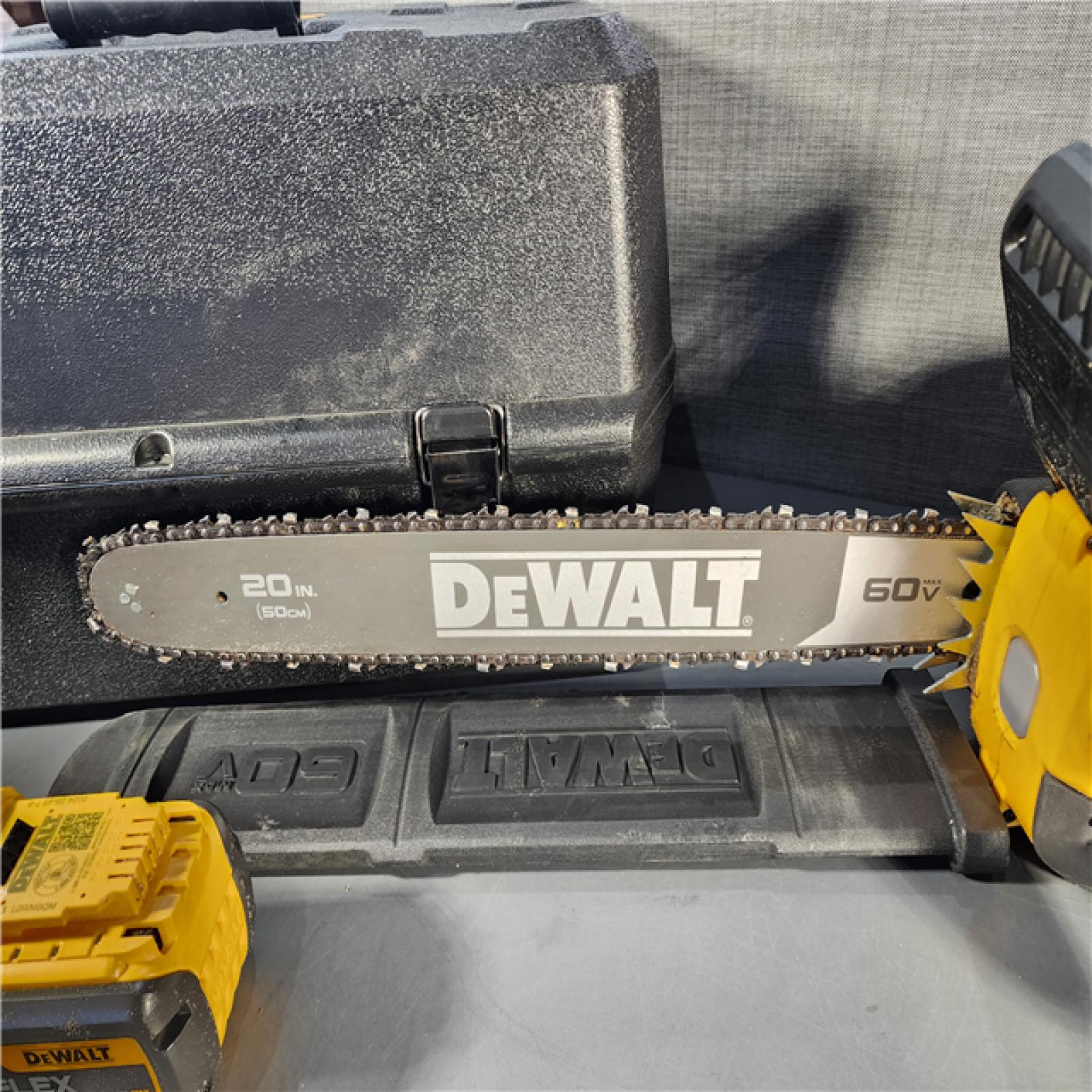 HOUSTON LOCATION - AS-IS FLEXVOLT 60V MAX 20 in. Brushless Electric Cordless Chainsaw Kit and Carry Case with (1) FLEXVOLT 12 Ah Battery & Charger