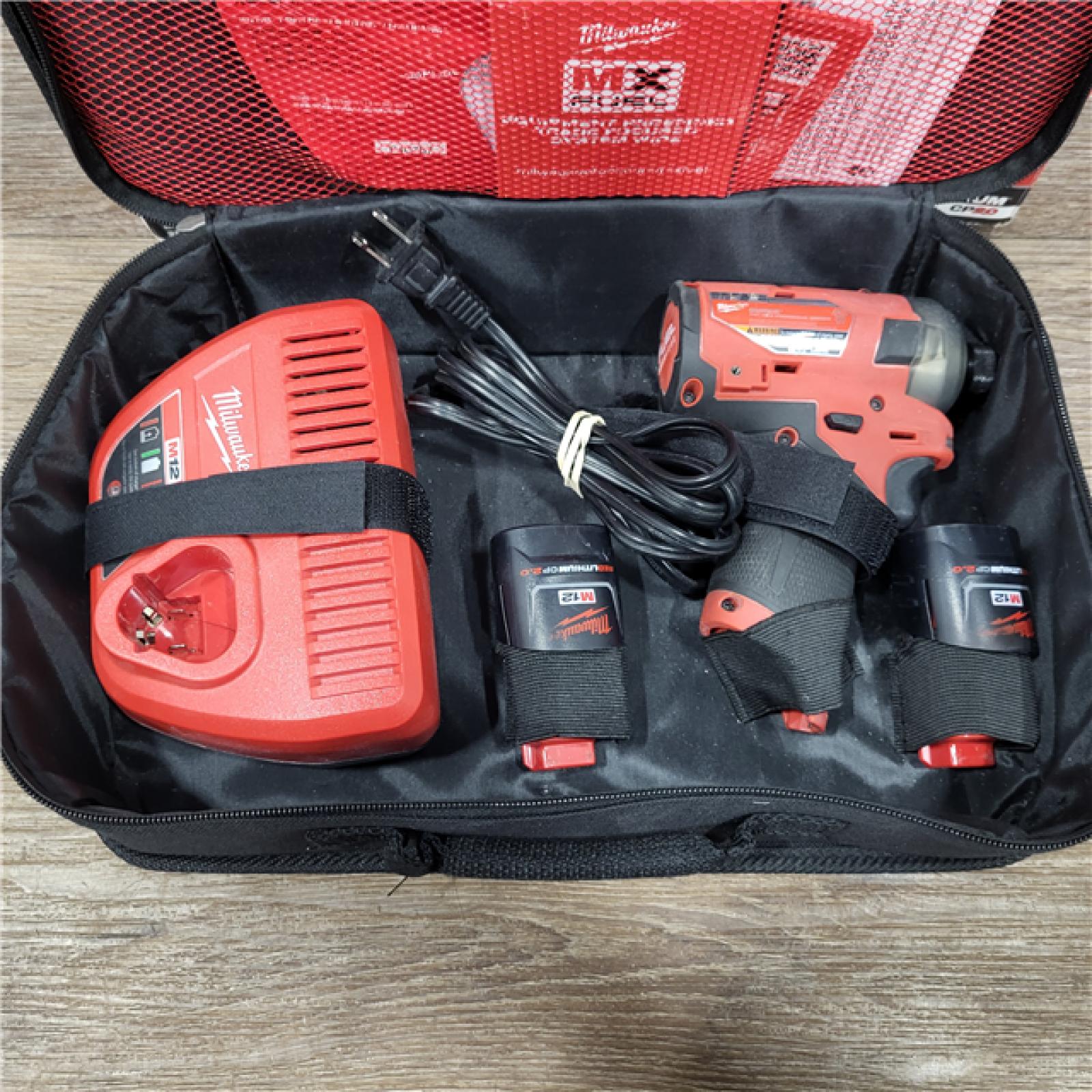 AS-IS M12 FUEL SURGE 12V Lithium-Ion Brushless Cordless 1/4 in. Hex Impact Driver Compact Kit W/Two 2.0Ah Batteries, Bag