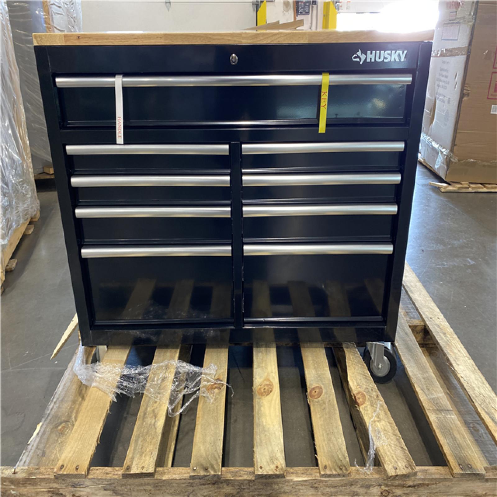 DALLAS LOCATION -Husky Tool Storage 46 in. W Standard Duty Black Mobile Workbench Cabinet with Solid Top Full Length Extension Table