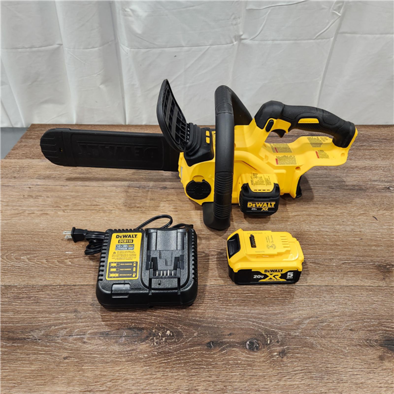 AS-IS Dewalt 7605686 12 in. 20V Battery Powered Chainsaw