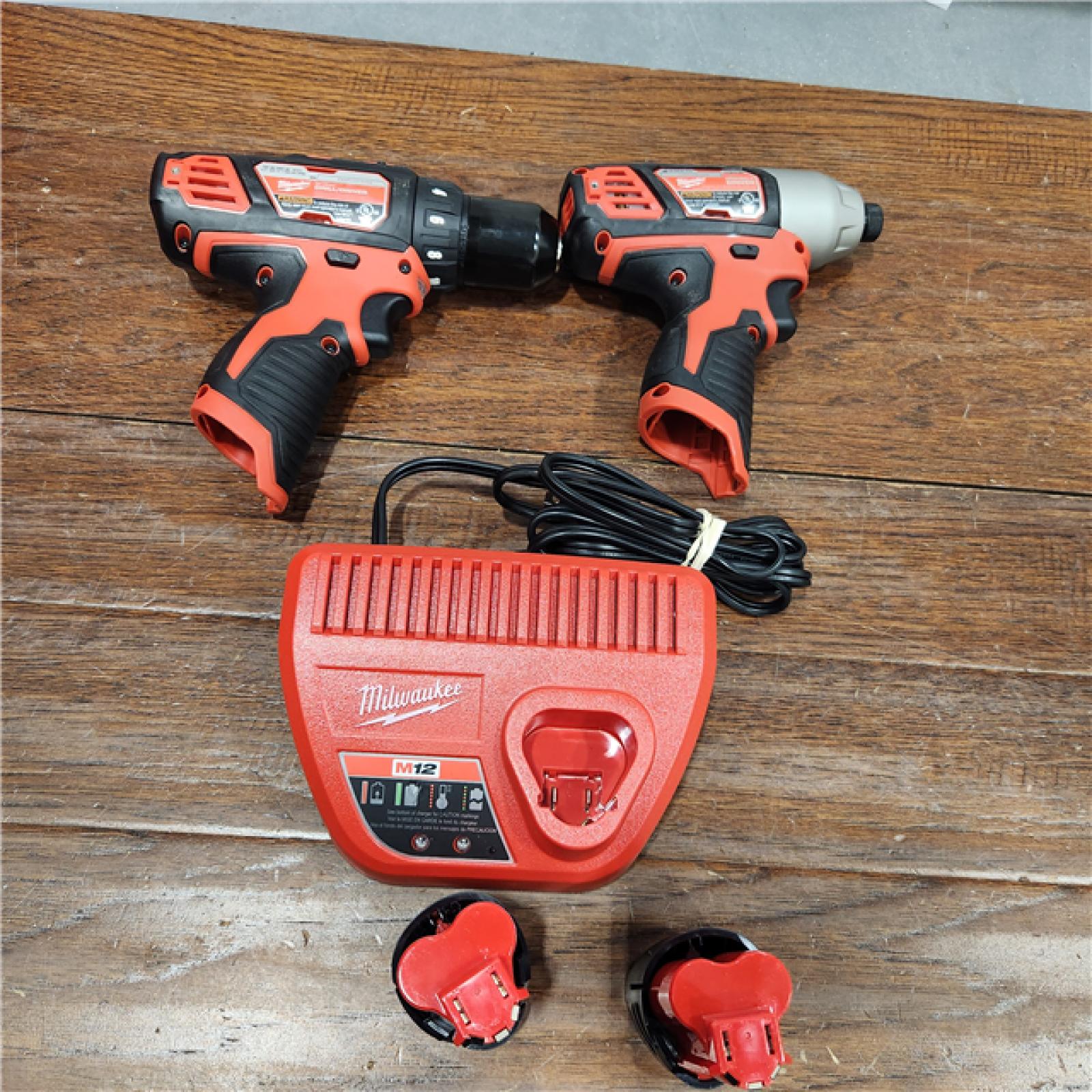 AS-IS M12 12V Lithium-Ion Cordless Drill Driver/Impact Driver Combo Kit with Two 1.5Ah Batteries, Charger and Bag (2-Tool)