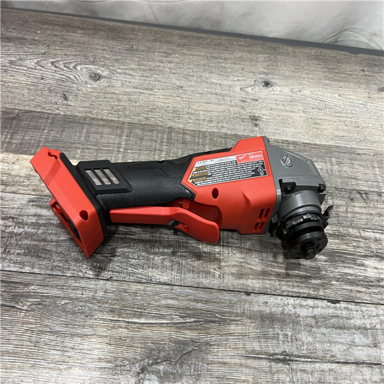 AS-IS Milwaukee 2880-20 M18 FUEL 18-Volt Lithium-Ion Brushless Cordless 4-1/2 in./5 in. Grinder W/Paddle Switch (Tool-Only)