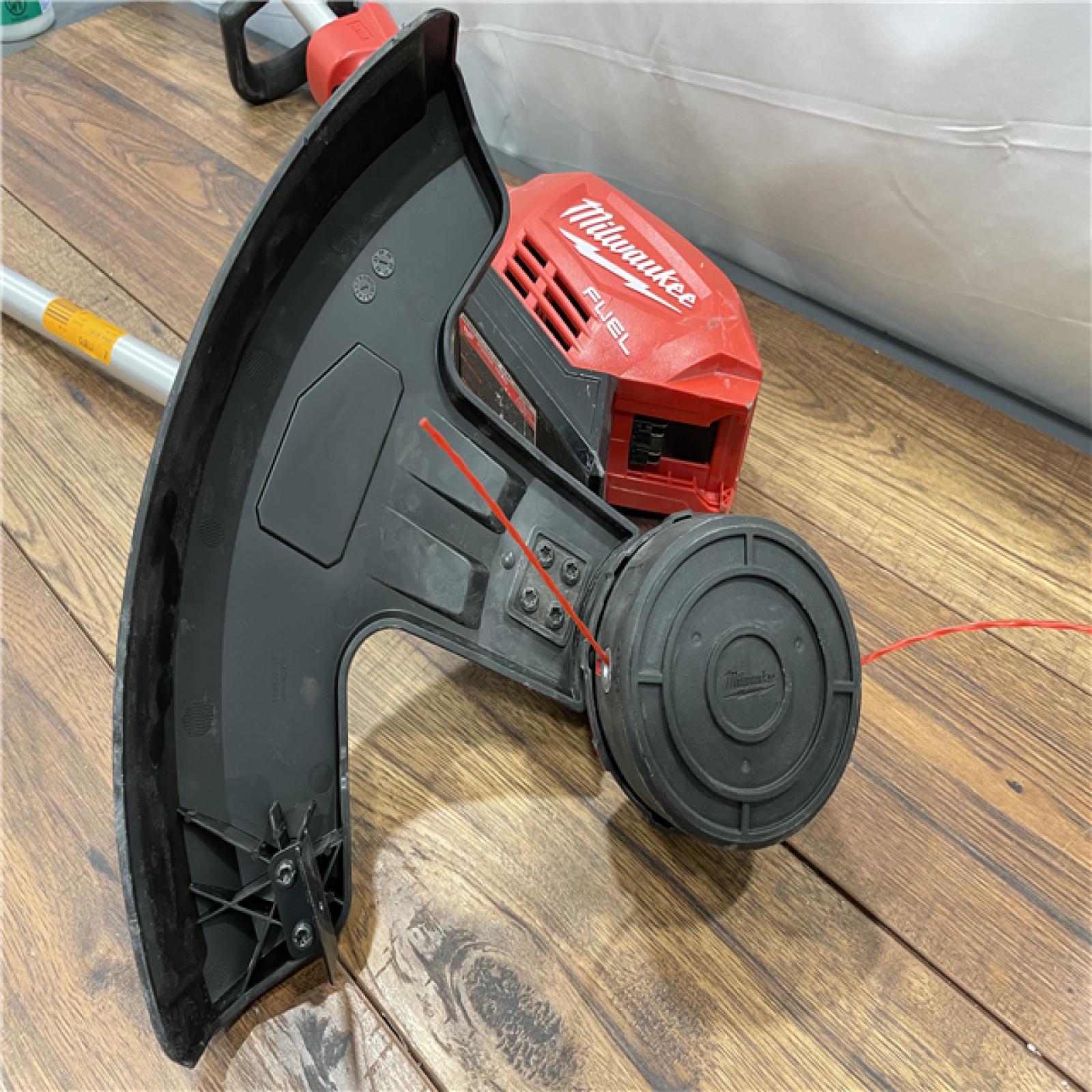 AS-IS Milwaukee M18 FUEL 18V Lithium-Ion Cordless Brushless String Grass Trimmer with Attachment Capability (Tool-Only)