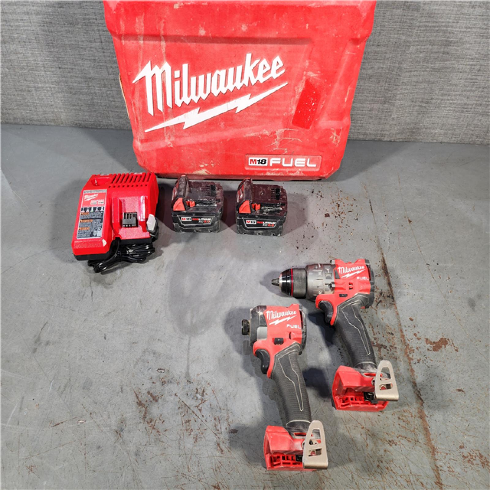 HOUSTON LOCATION - AS-IS Milwaukee M18 FUEL 18V Lithium-Ion Brushless Cordless Hammer Drill and Impact Driver Combo Kit (2-Tool) with 2 Batteries