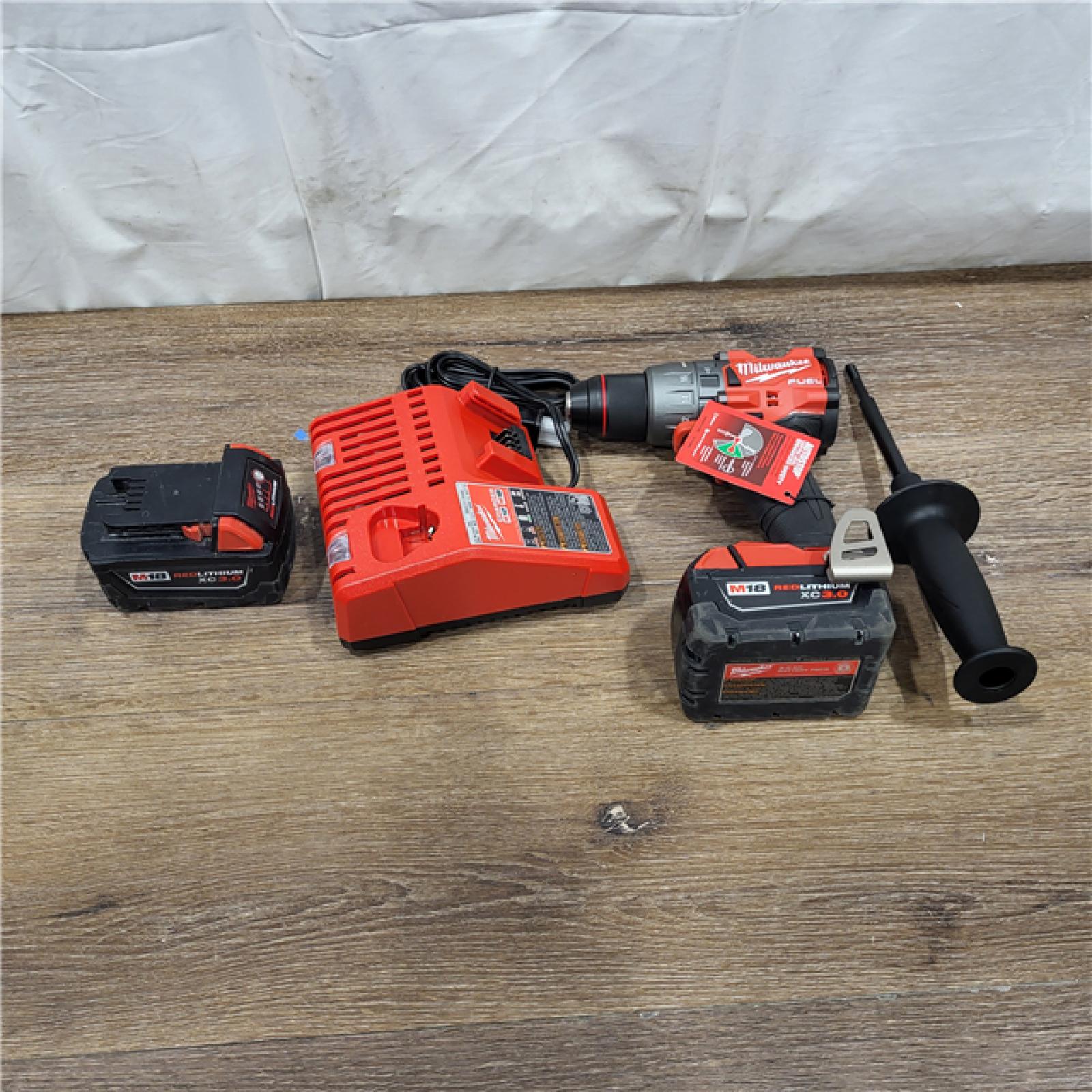 AS-ISMilwaukee 2904-22 Hammer Drill Driver Kit with Batteries  Charger & Tool Case  Red