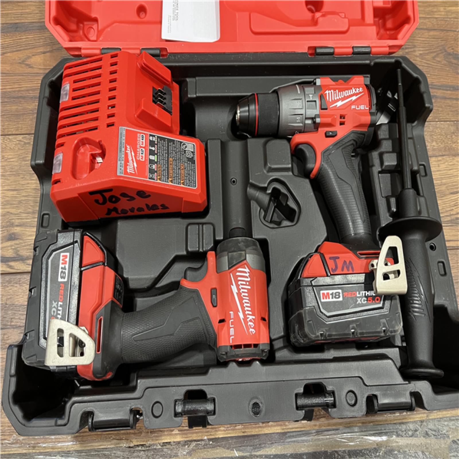 AS-IS Milwaukee M18 FUEL 18V Lithium-Ion Brushless Cordless Hammer Drill and Impact Driver Combo Kit (2-Tool) with 2 Batteries