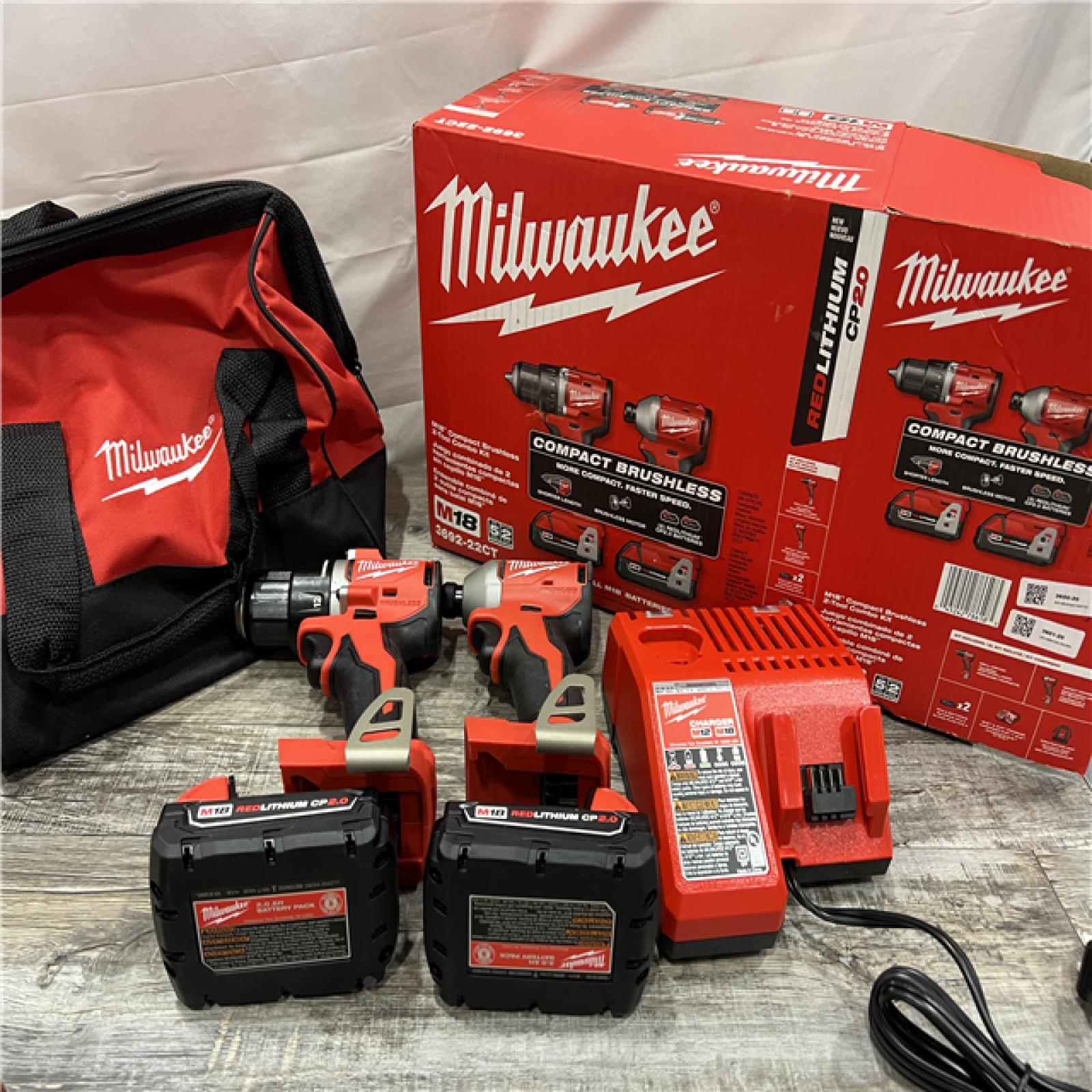 AS-IS MILWAUKEE M18 18V Lithium-Ion Brushless Cordless Compact Drill/Impact Combo Kit (2-Tool) W/(2) 2.0 Ah Batteries, Charger & Bag