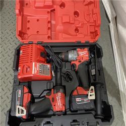 Houston location AS-IS Milwaukee 3697-22 M18 FUEL 1/2 Hammer Driller/Driver &1/4 Hex Impact Driver 2 Tool Combo Kit