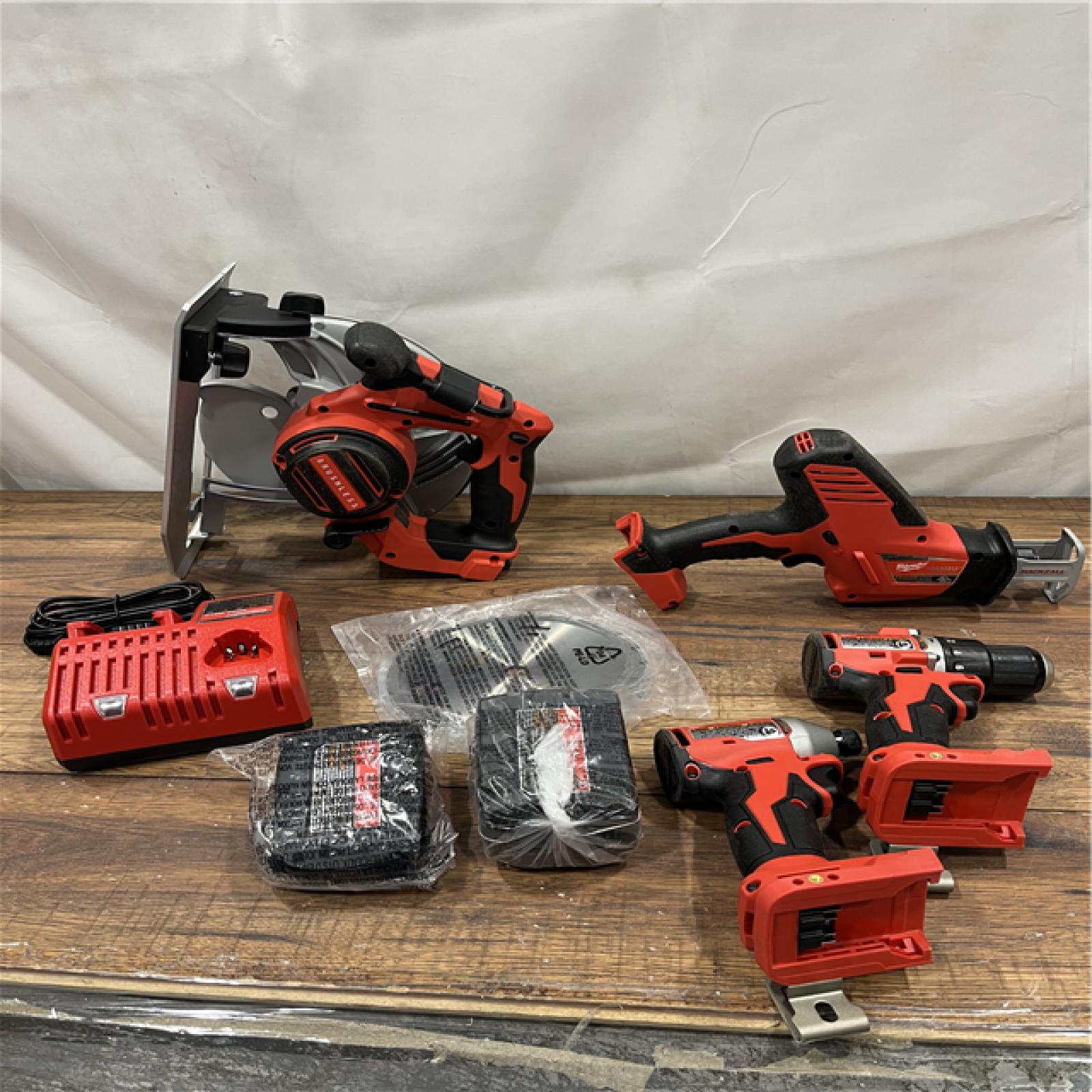 AS-IS Milwaukee M18 18-Volt Lithium-Ion Brushless Cordless Combo Kit (4-Tool) with 2-Batteries, 1-Charger and Tool Bag