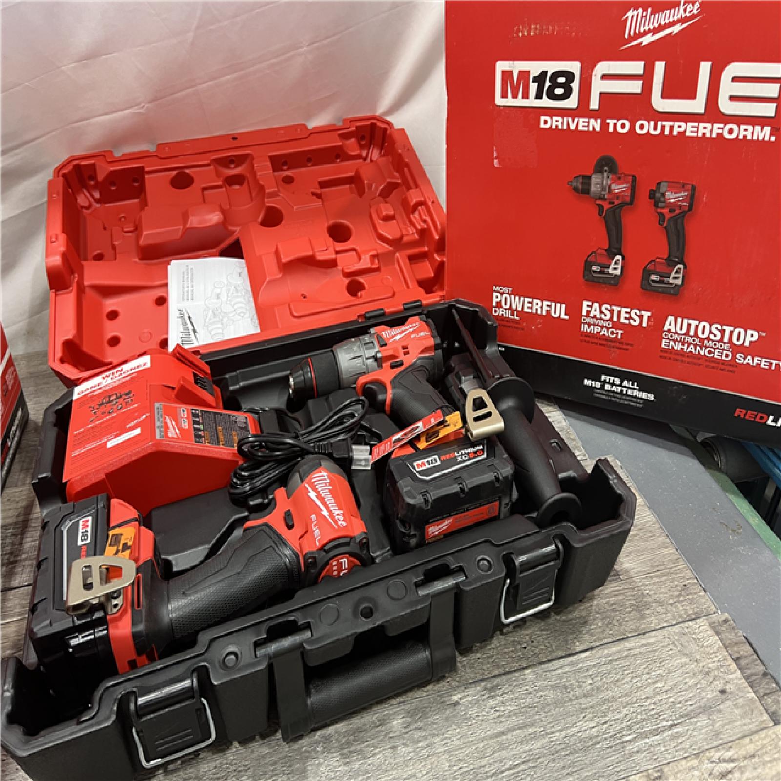 AS-IS MILWAUKEE M18 FUEL 18V Lithium-Ion Brushless Cordless Hammer Drill and Impact Driver Combo Kit (2-Tool) with 2 Batteries