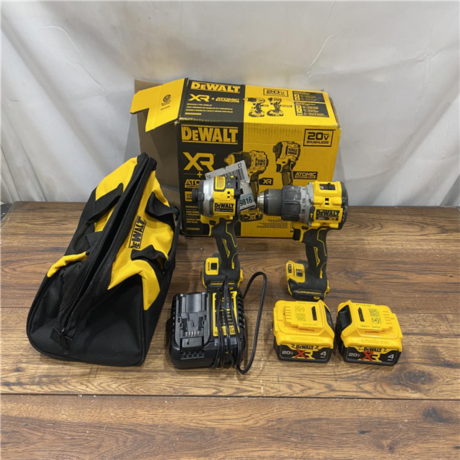 AS IS DEWALT 20V MAX XR Hammer Drill and ATOMIC Impact Driver 2 Tool Cordless Combo Kit with (2) 4.0Ah Batteries, Charger, and Bag