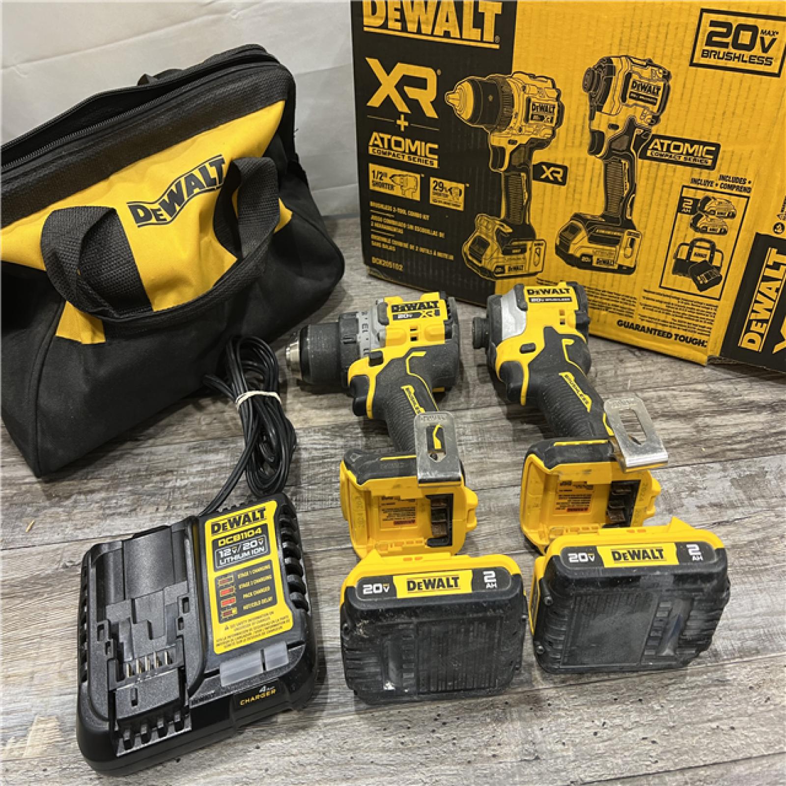 AS-IS DEWALT 20V MAX XR Cordless Drill/Driver, ATOMIC Impact Driver 2 Tool Combo Kit, (2) 2.0Ah Batteries, Charger, and Bag