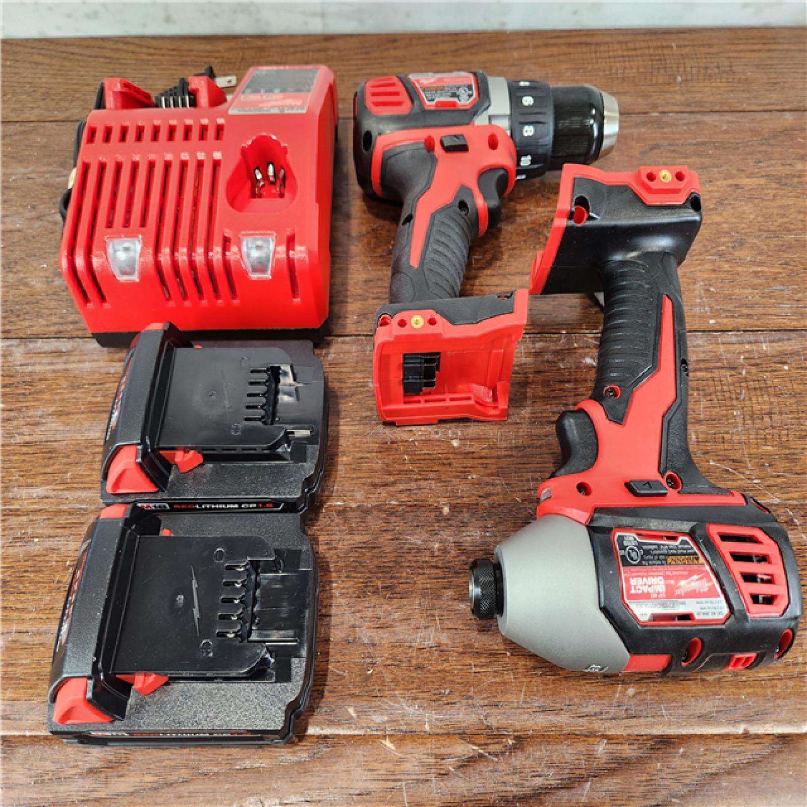 AS-IS Milwaukee M18 Brushed Cordless (2-Tool) Drill/Driver and Impact Driver Kit