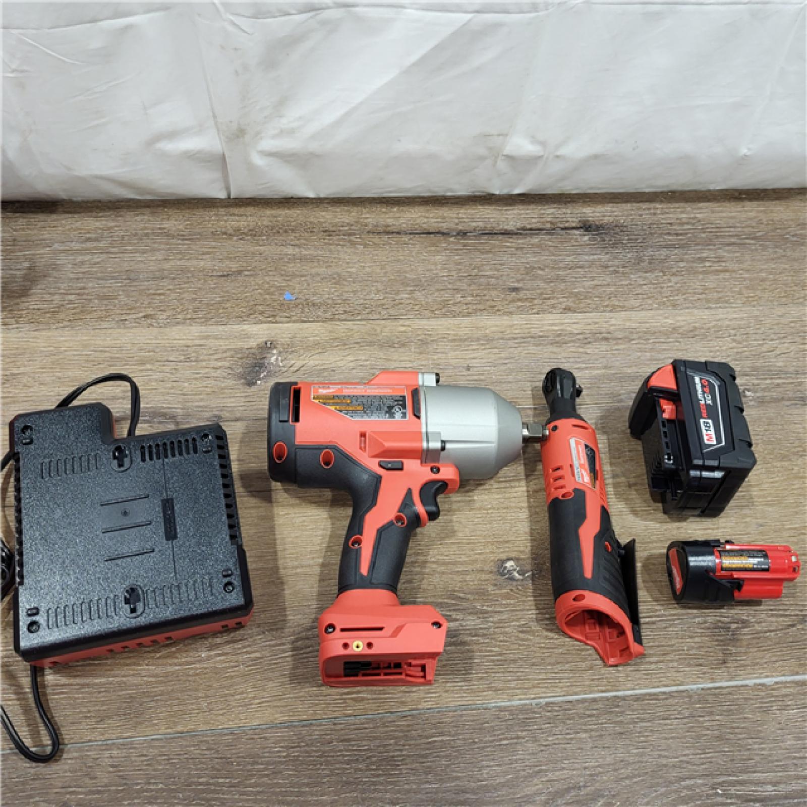 AS-IS M12/M18 12/18V Lithium-Ion Cordless 3/8 in. Ratchet and 1/2 in. High Torque Impact Wrench with Friction Ring Combo Kit