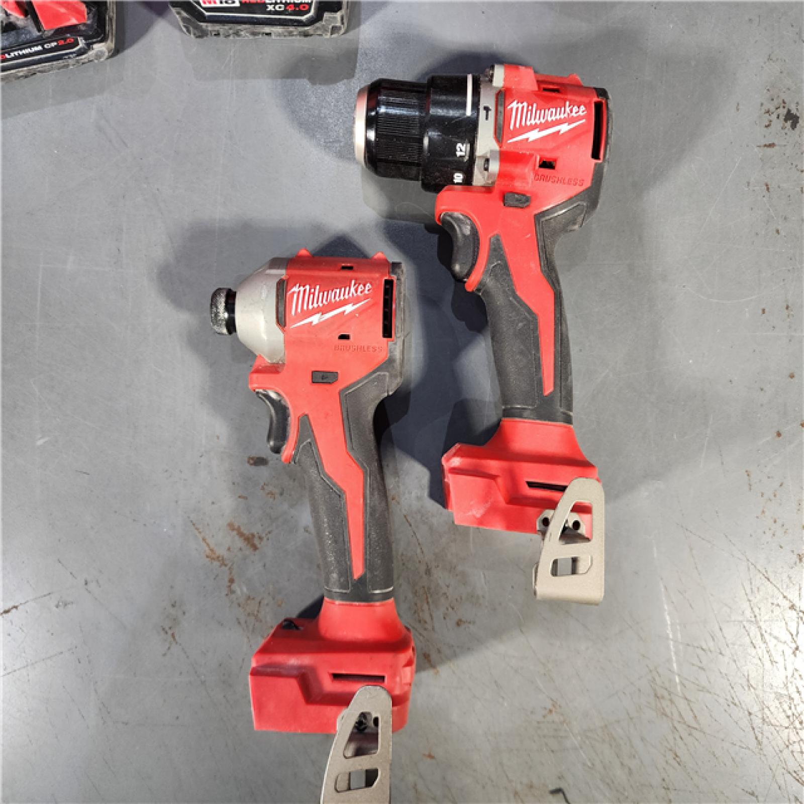 HOUSTON LOCATION - AS-IS M18 18-Volt Lithium-Ion Brushless Cordless Compact Hammer Drill/Impact Combo Kit (2-Tool) with (2) Batteries, Bag