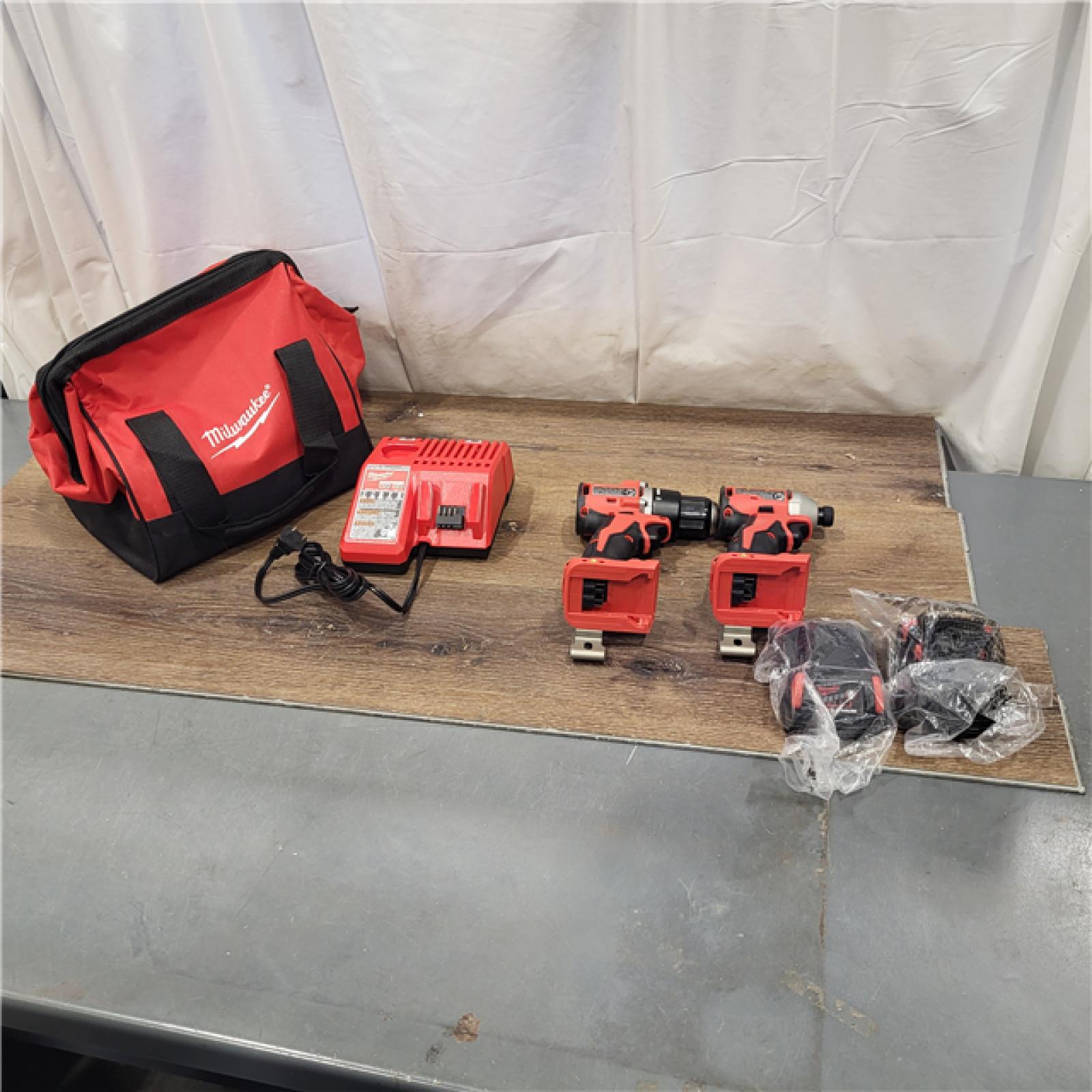 AS-IS Milwaukee M18 Compact Brushless 2-Tool Combo Kit