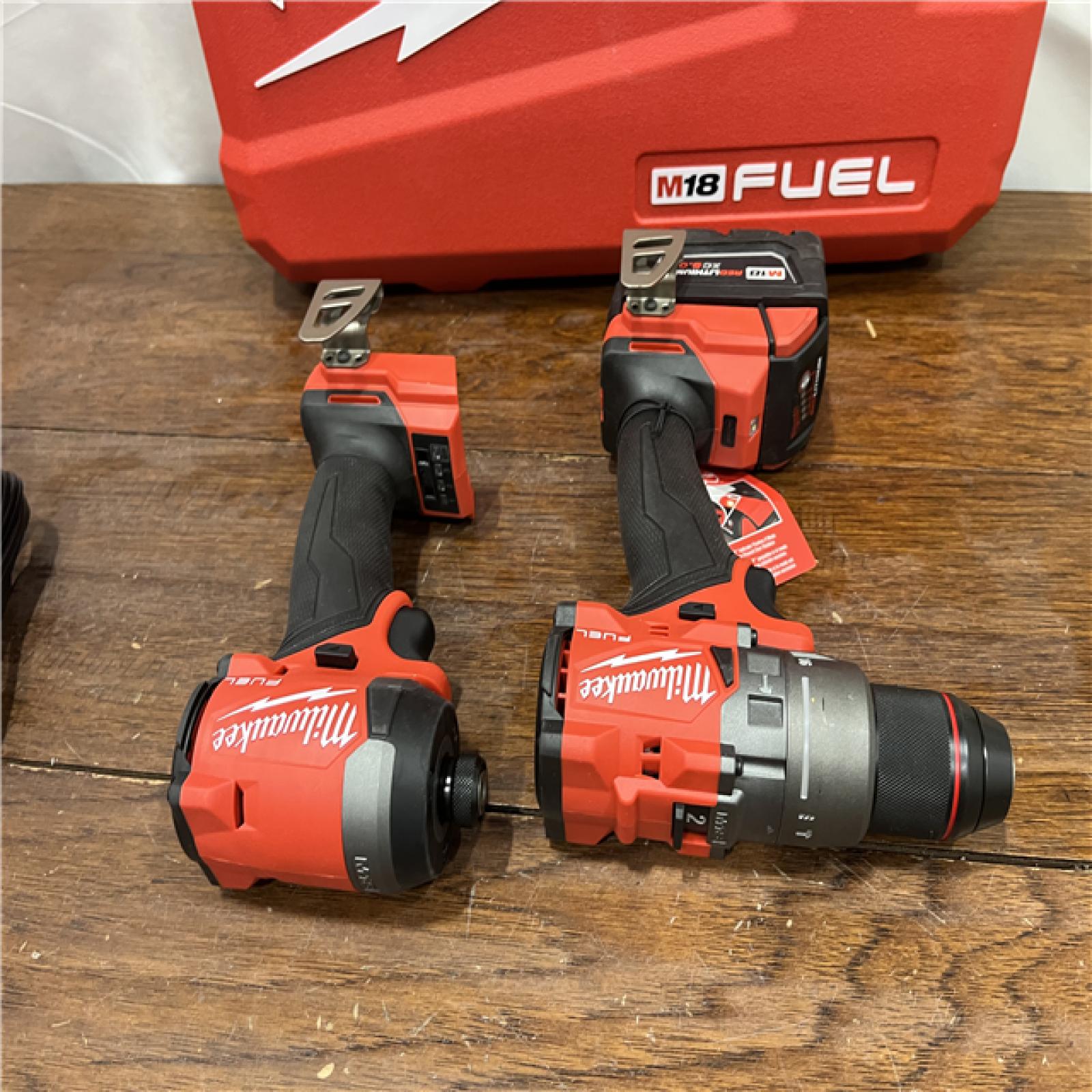 AS-ISMilwaukee M18 FUEL 18V Lithium-Ion Brushless Cordless Hammer Drill and Impact Driver Combo Kit (2-Tool) with 2 Batteries