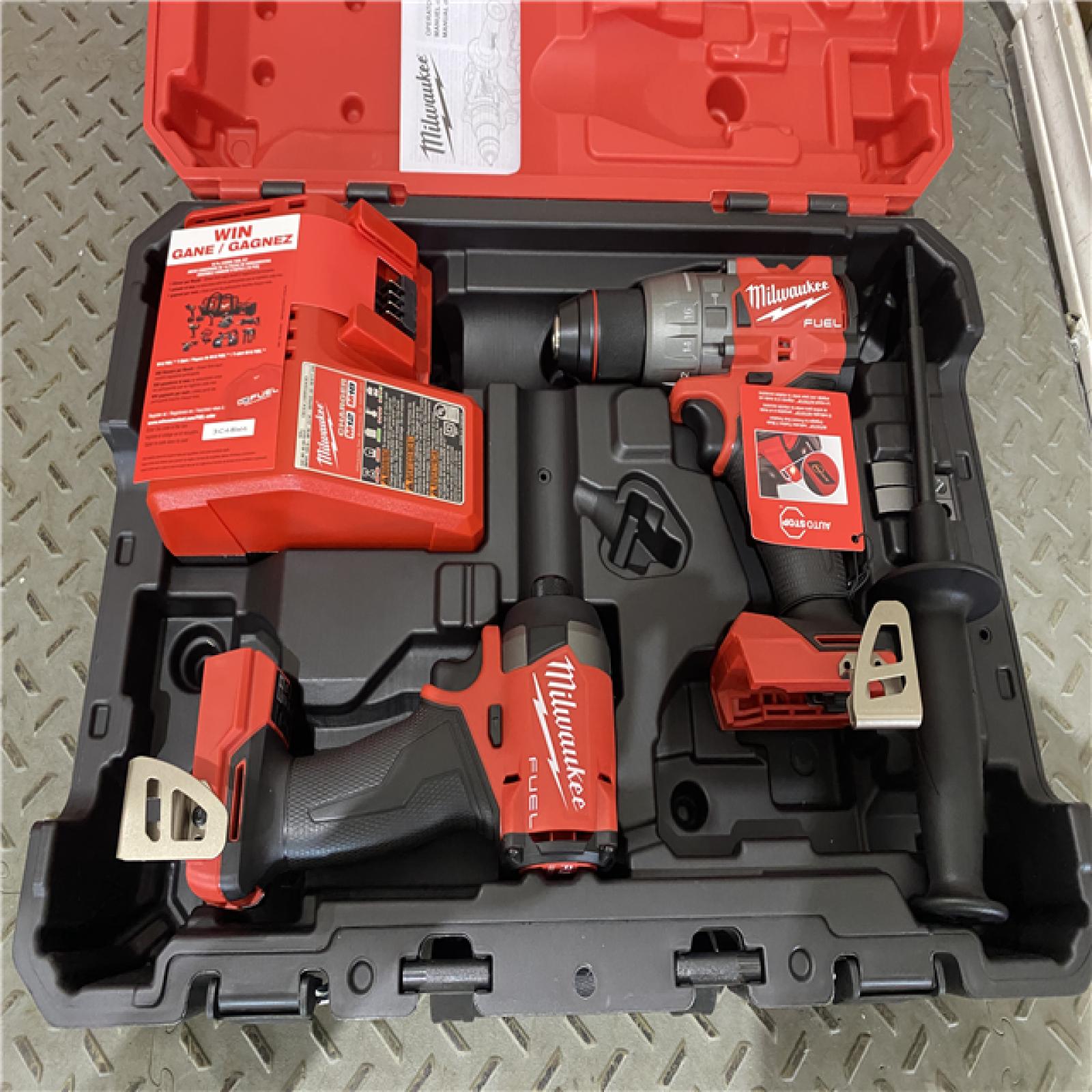 Houston location AS-IS MILWAUKEE M18 FUEL 18V Lithium-Ion Brushless Cordless Hammer Drill and Impact Driver Combo Kit (2-Tool) ONLY CHARGER