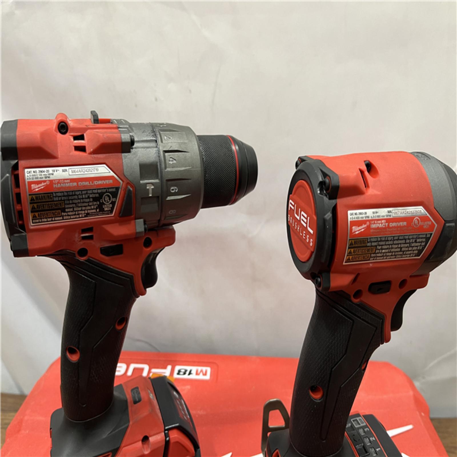 AS-IS Milwaukee M18 FUEL 18V Lithium-Ion Brushless Cordless Hammer Drill and Impact Driver Combo Kit (2-Tool) with 2 Batteries