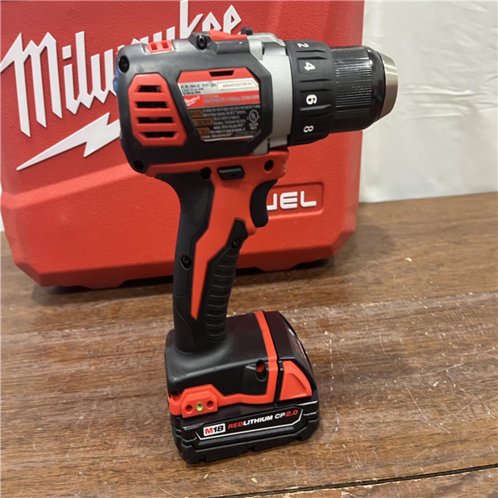 AS-ISMilwaukee 2904-22 Hammer Drill Driver Kit with Batteries  Charger & Tool Case  Red