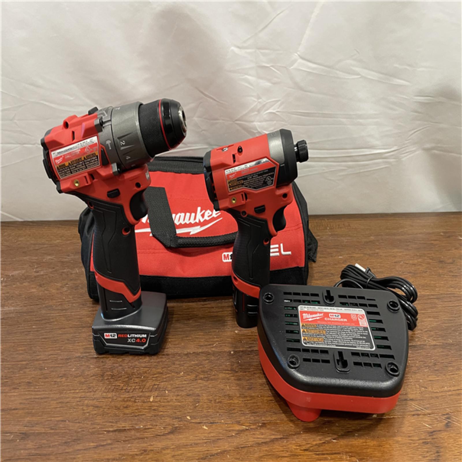 AS-IS Milwaukee 3497-22 12V Brushless Hammer Drill and Impact Driver Combo Kit