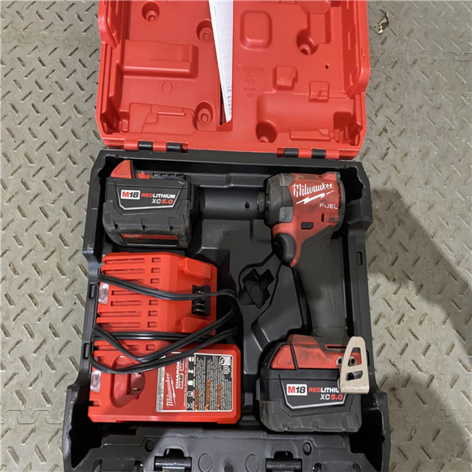 Houston location AS-IS Milwaukee 2953-22 M18 FUELâ„¢ 1/4   Hex Impact Driver Kit